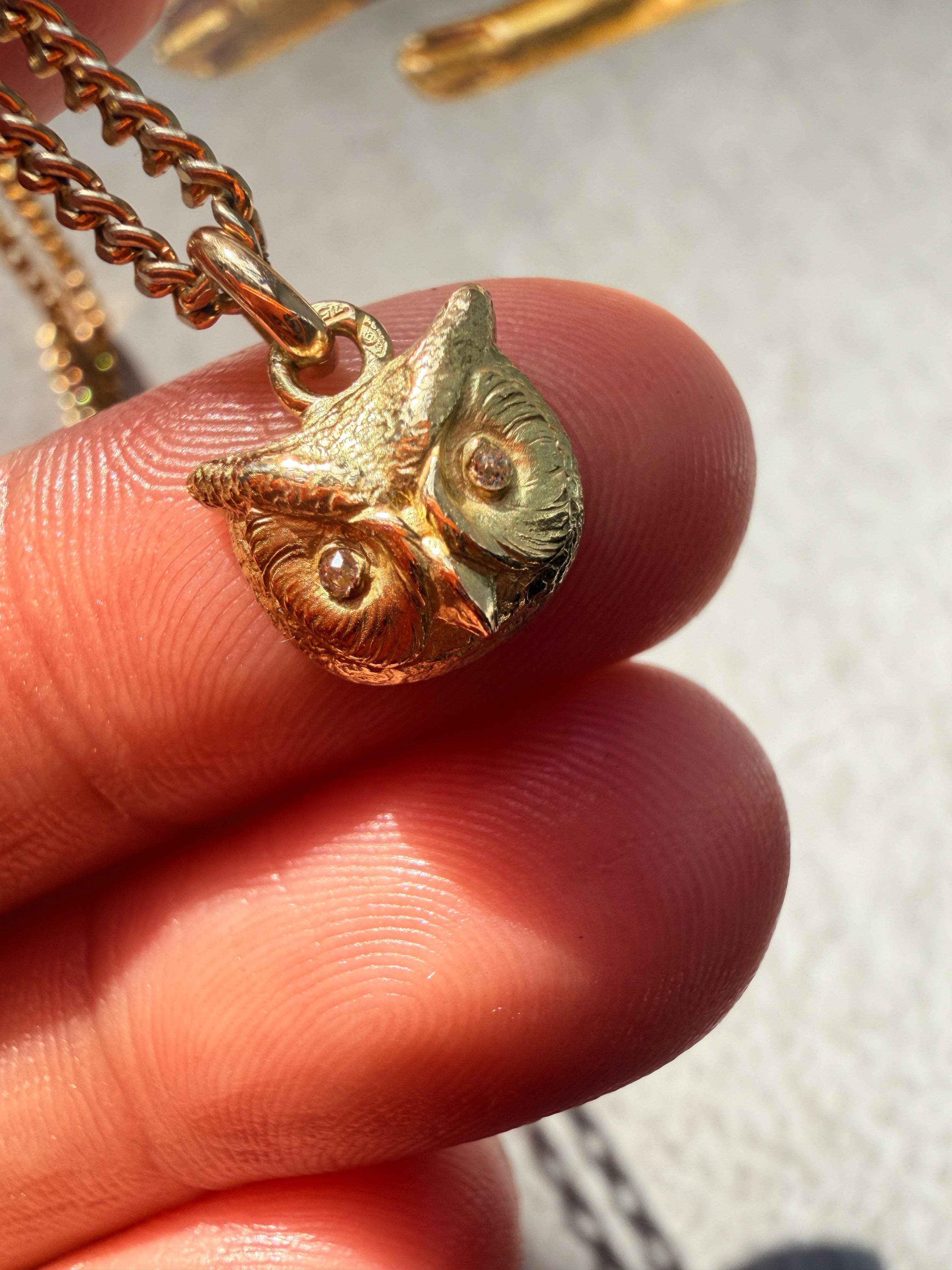 Antique 18K yellow gold owl pendant