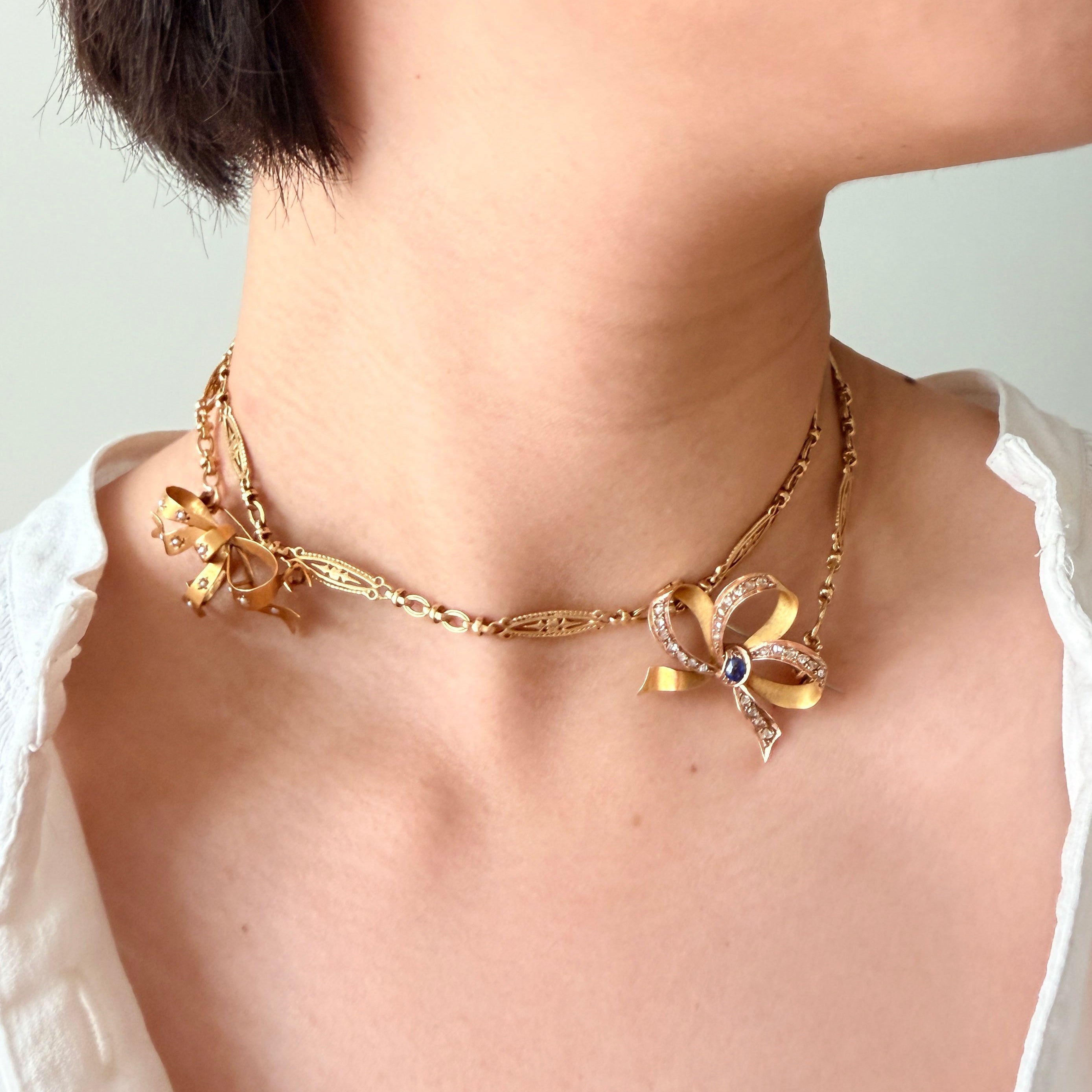 Beautiful pair of 19th Century 18K Gold Bow Brooches