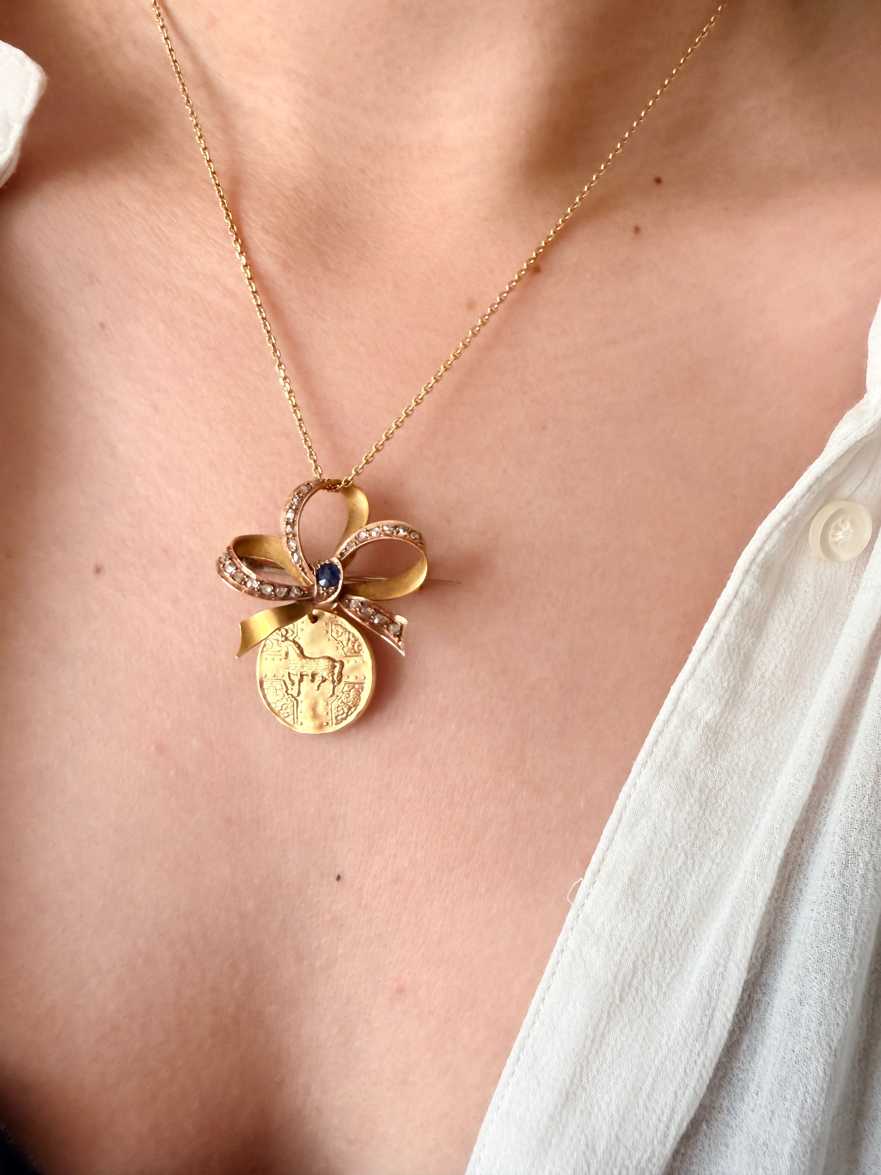 Beautiful pair of 19th Century 18K Gold Bow Brooches