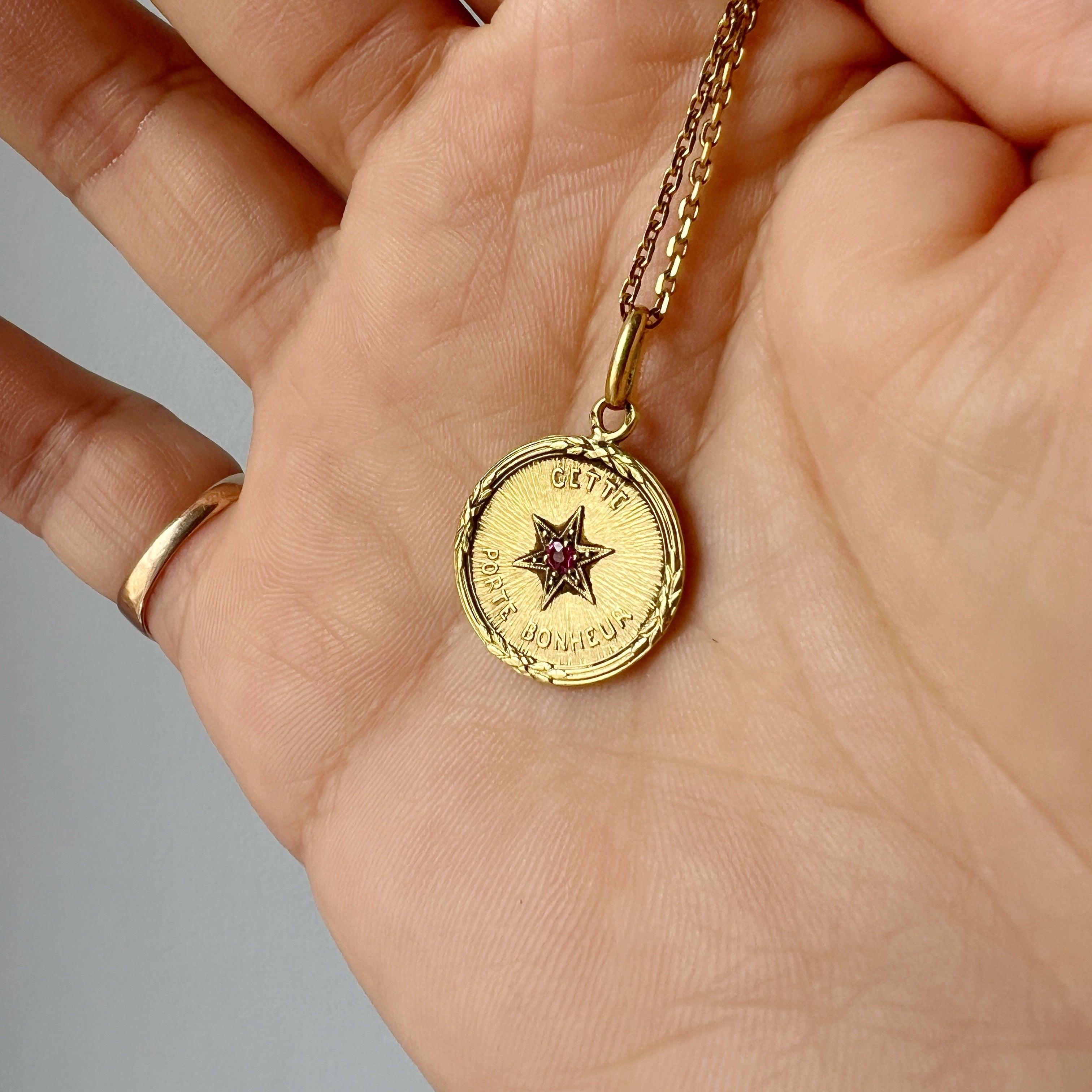 Rare French antique 18K ruby star medal pendant “this star brings happiness” - Curiously timeless