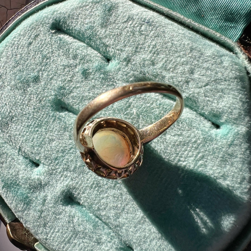 Victorian era 18K gold opal cabochon diamond halo ring