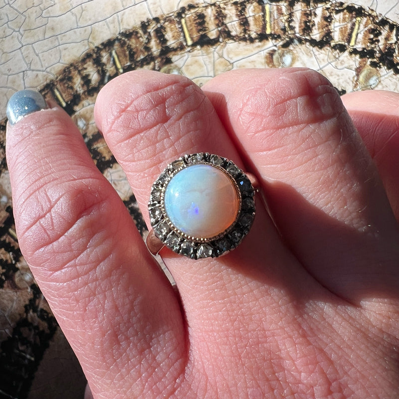 Victorian era 18K gold opal cabochon diamond halo ring