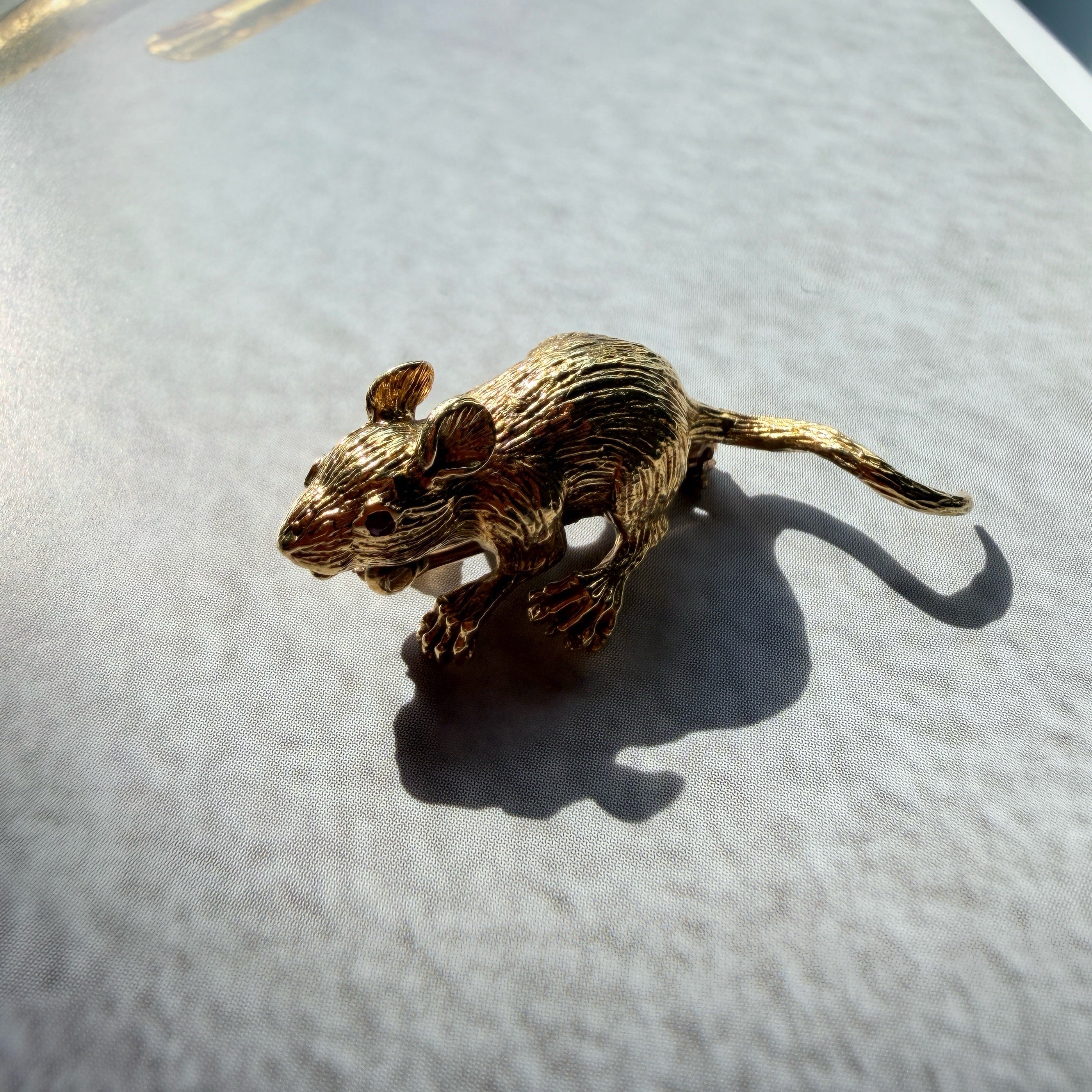 Vintage 18K yellow gold mouse brooch with ruby eyes