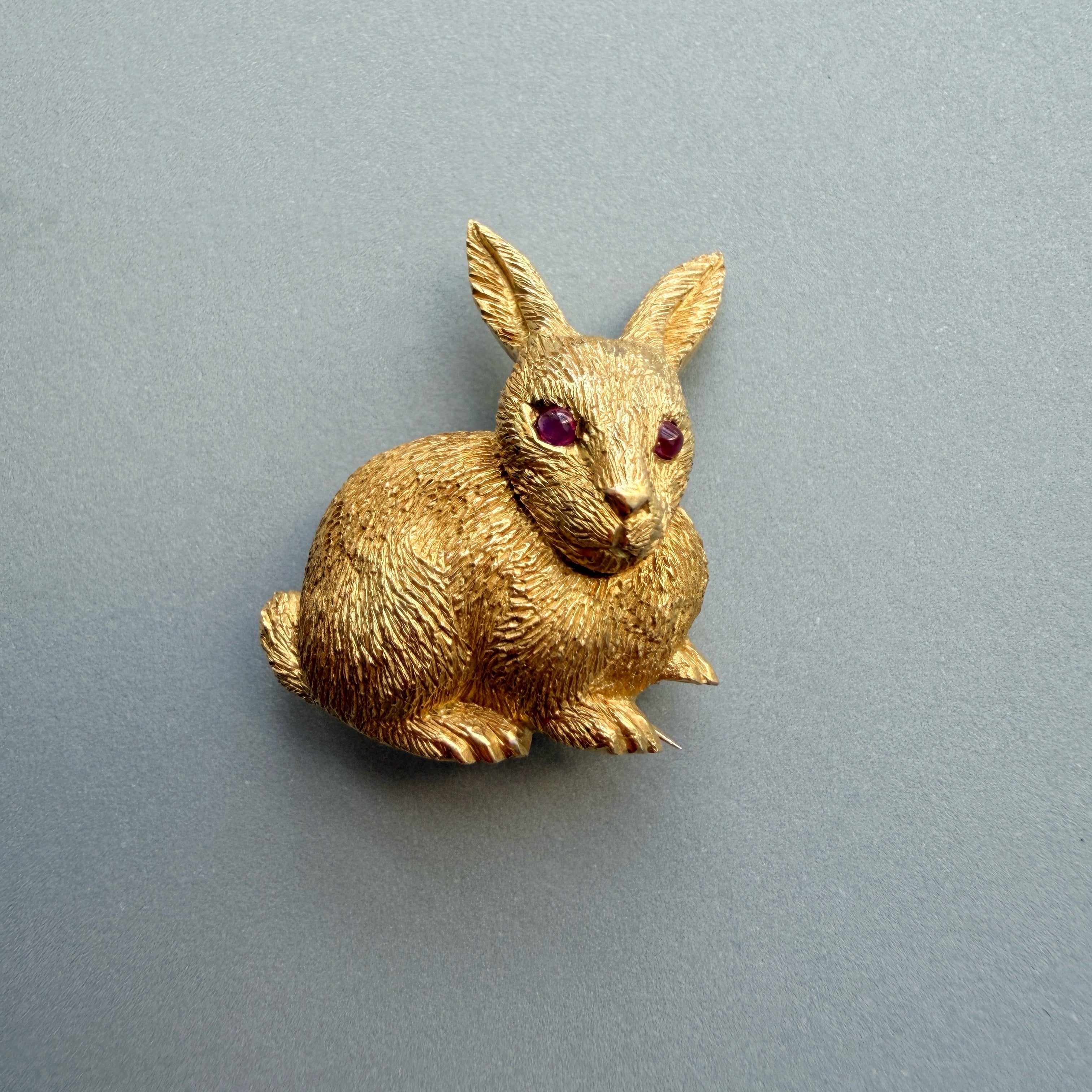 18k yellow gold rabbit brooch with ruby eyes