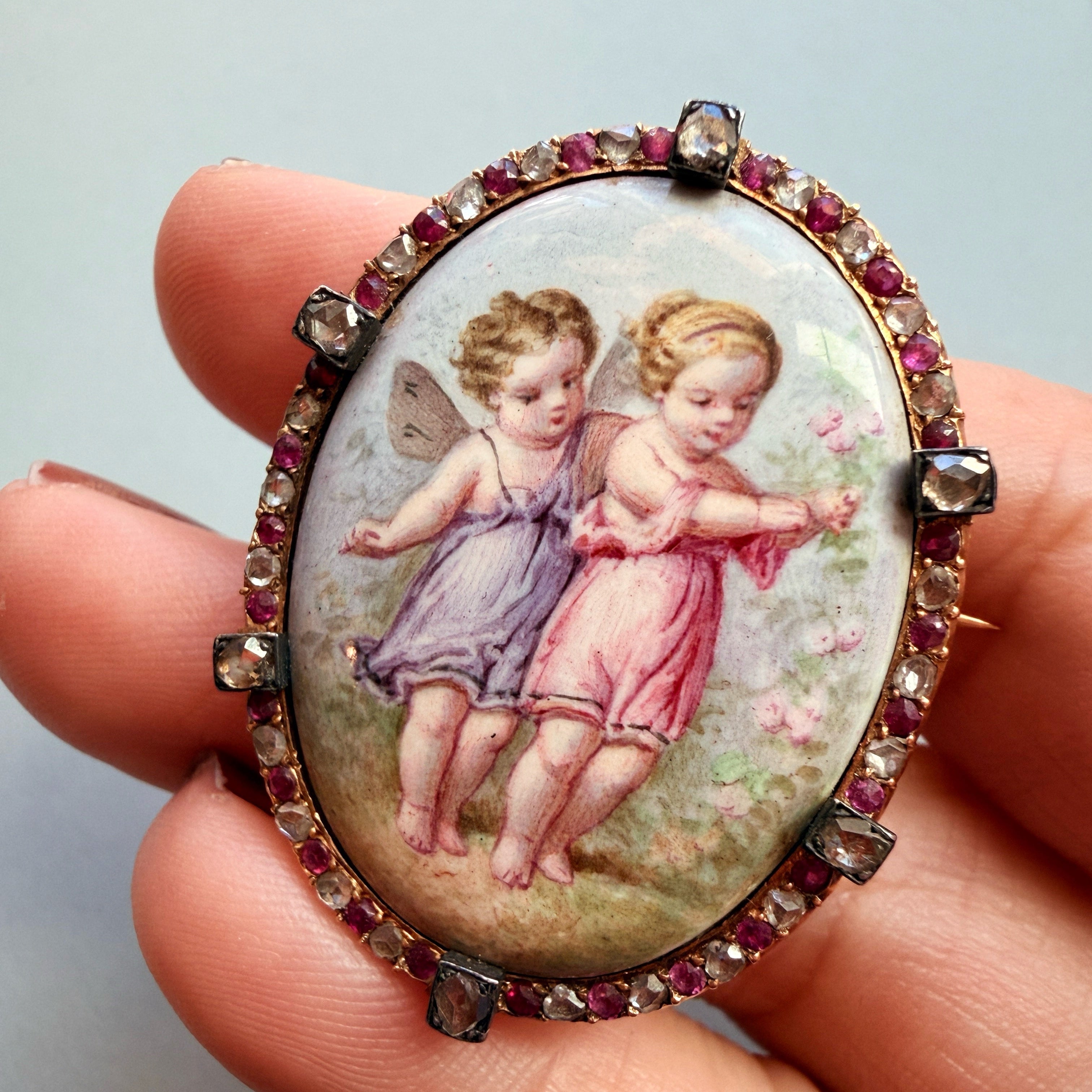 Victorian era 18K gold ruby diamond cherub miniature brooch