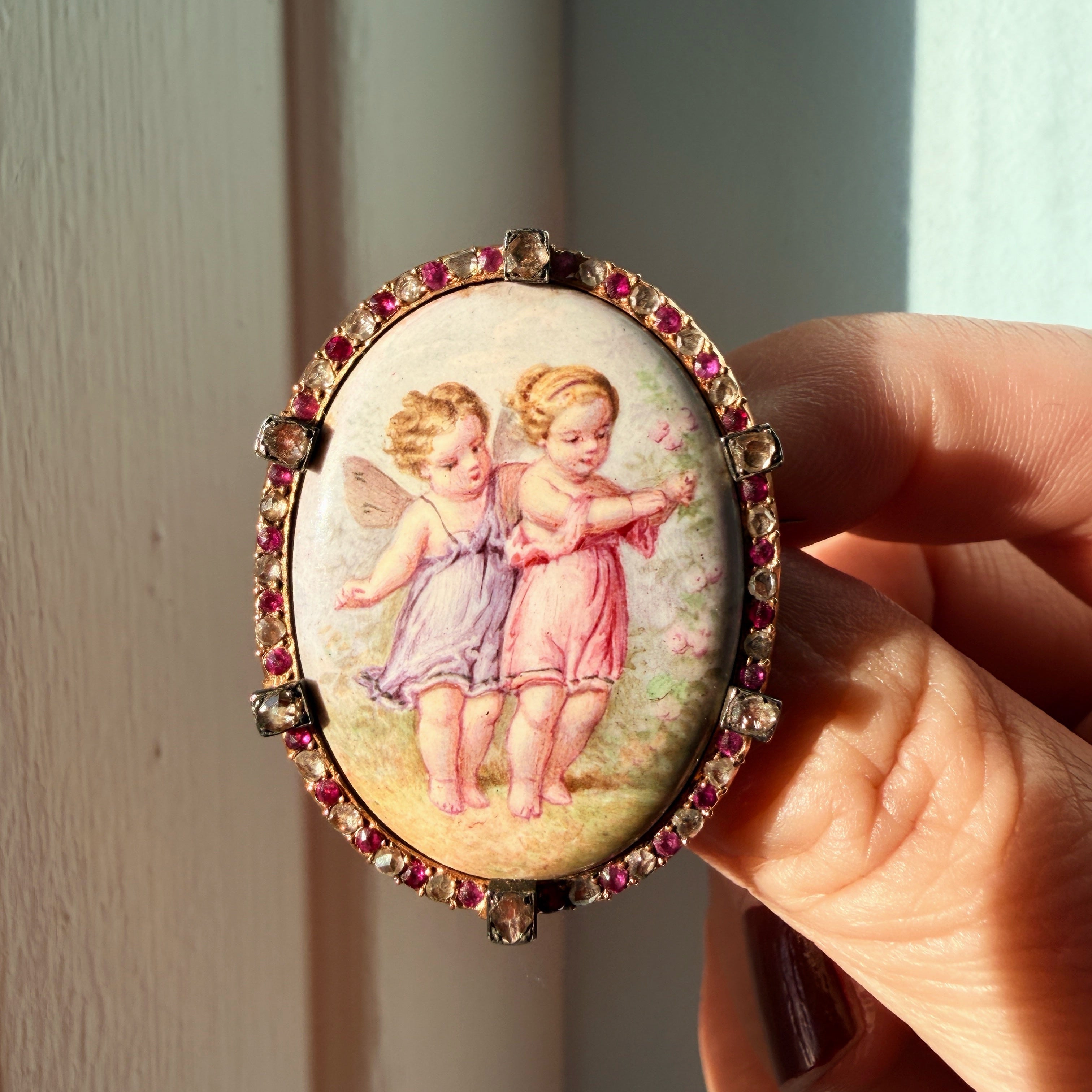 Victorian era 18K gold ruby diamond cherub miniature brooch