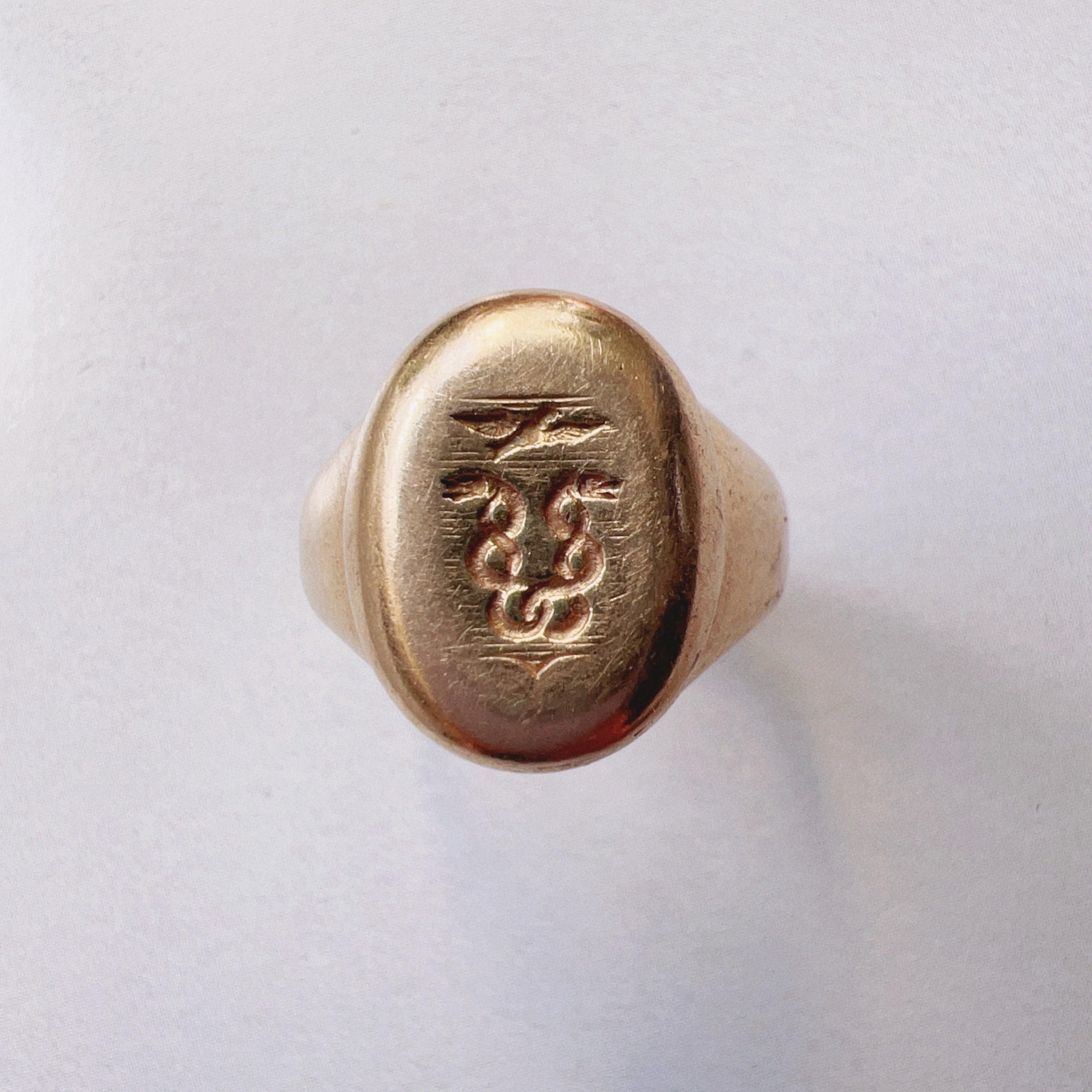 Antique 18K gold snakes and eagle signet ring - Curiously timeless