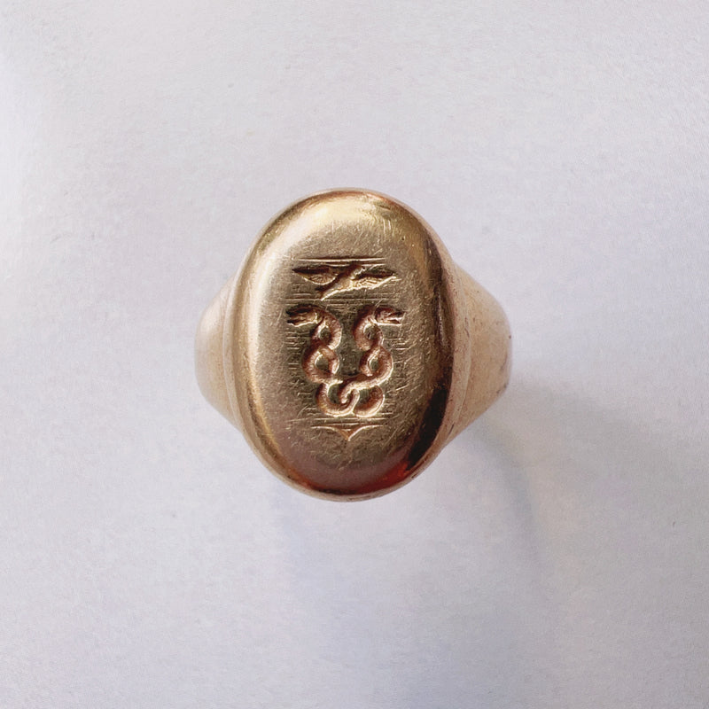 Antique 18K gold snakes and eagle signet ring