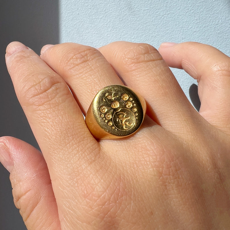 Antique 18K gold lion and sword signet ring