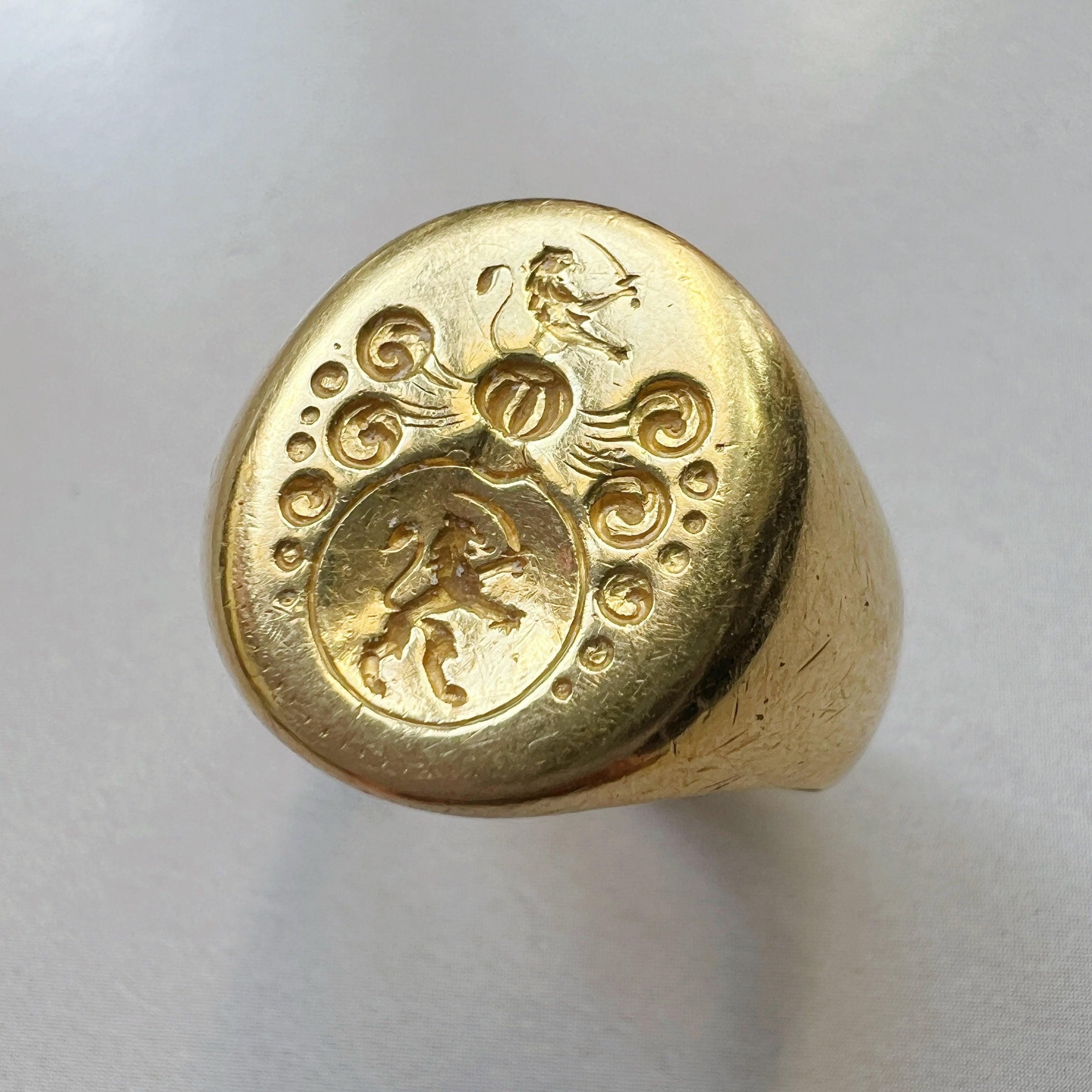 Antique 18K gold lion and sword signet ring - Curiously timeless