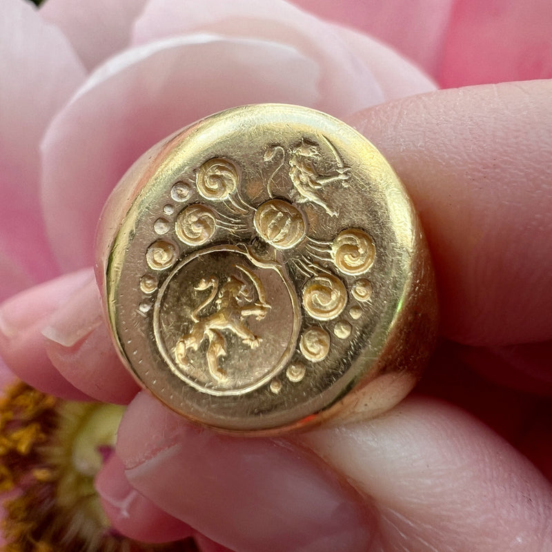 Antique 18K gold lion and sword signet ring