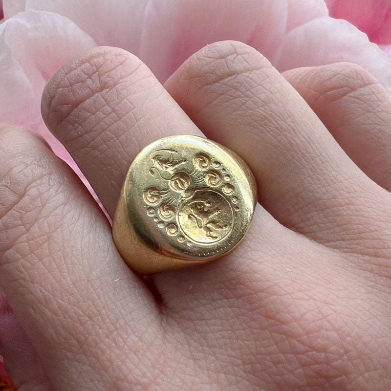 Antique 18K gold lion and sword signet ring