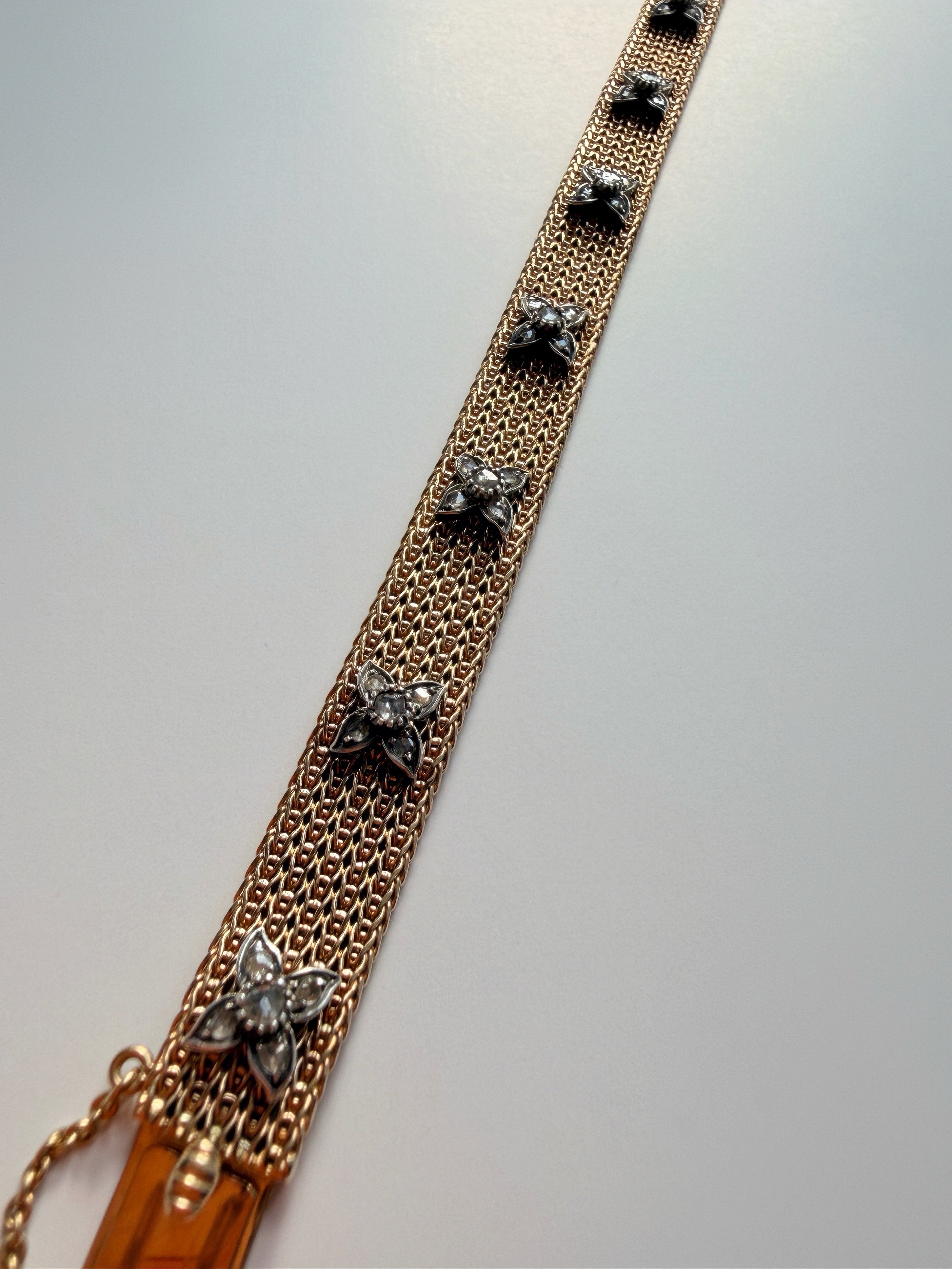 Vintage 18K yellow gold woven gold bracelet with diamond flowers