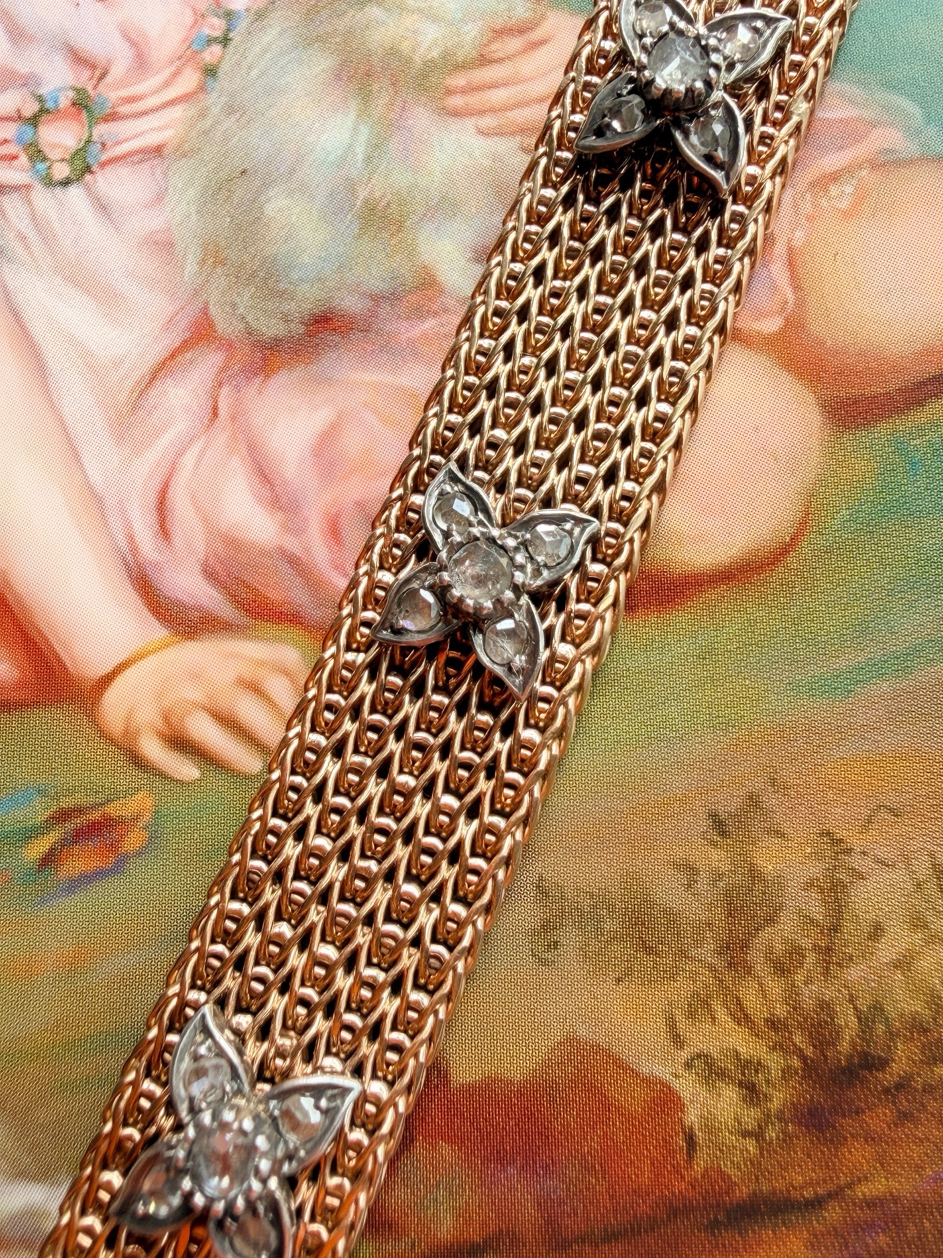 Vintage 18K yellow gold woven gold bracelet with diamond flowers