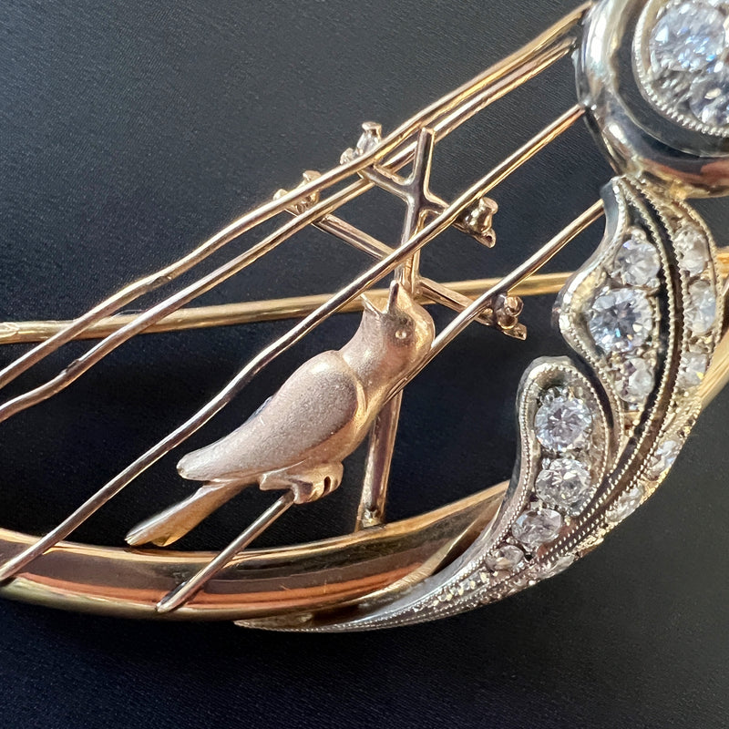 Vintage 18K gold diamond bird singing on a harp brooch