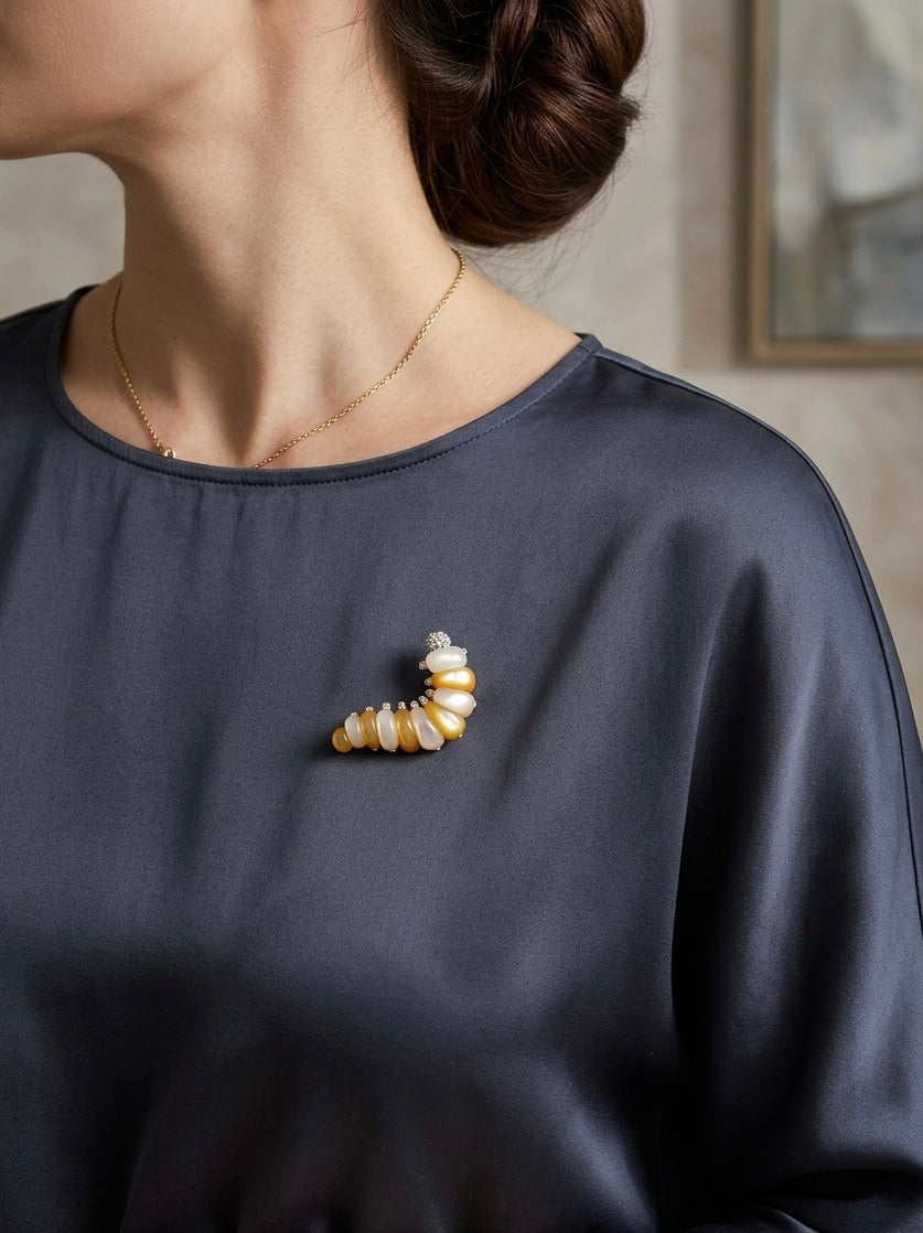 Vintage 18K yellow gold silk worm brooch