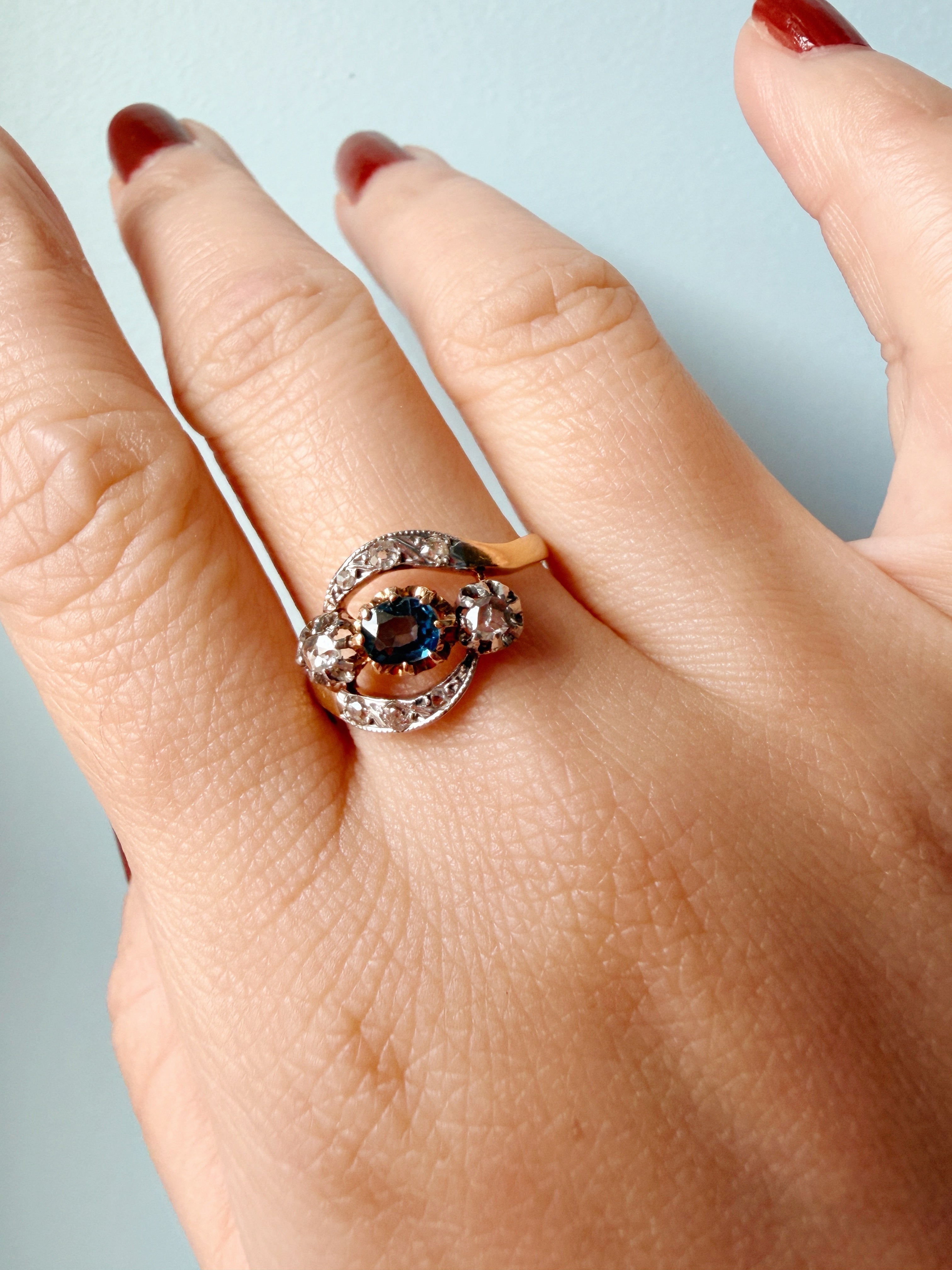 Antique 18K gold blue sapphire diamond tourbillon ring