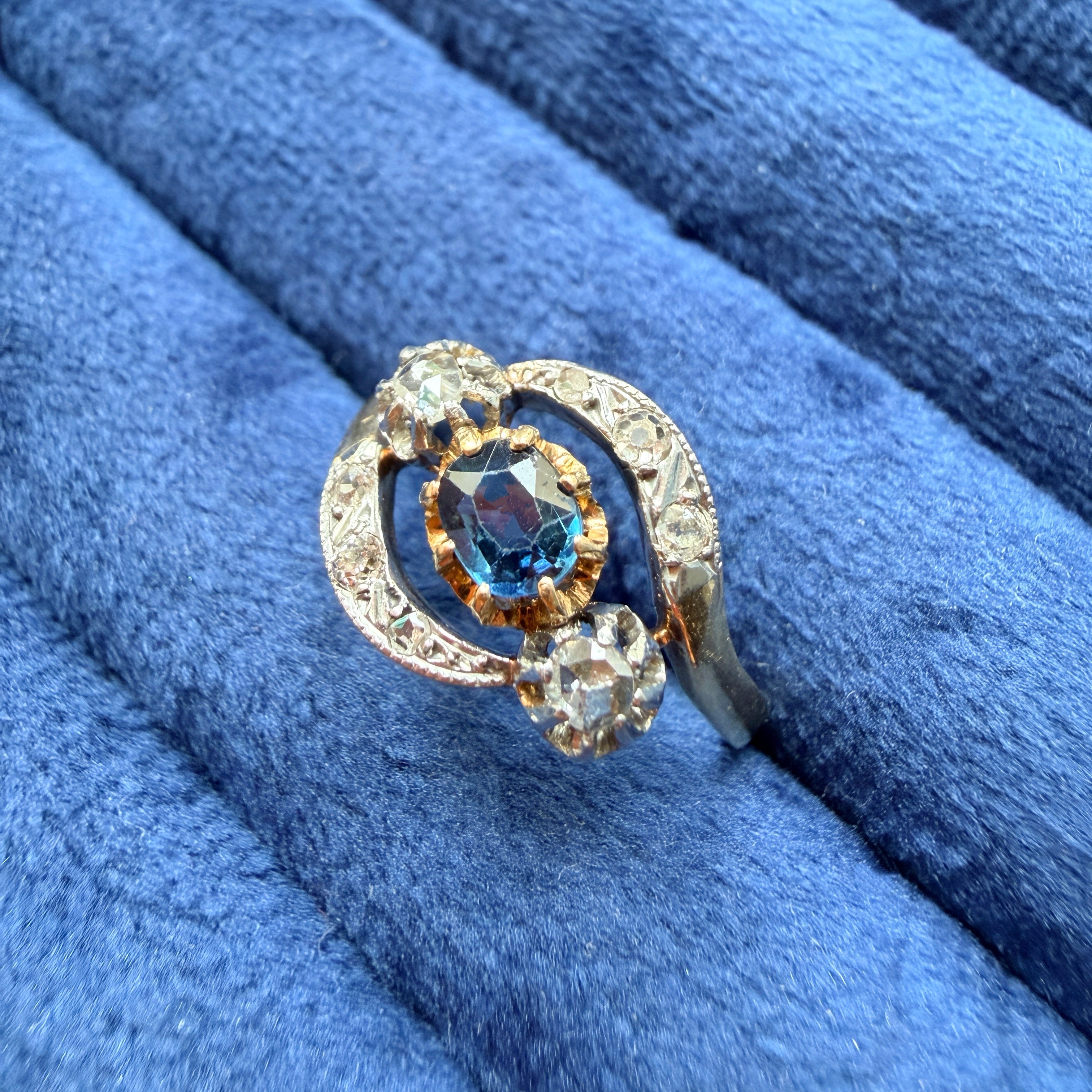 Antique 18K gold blue sapphire diamond tourbillon ring
