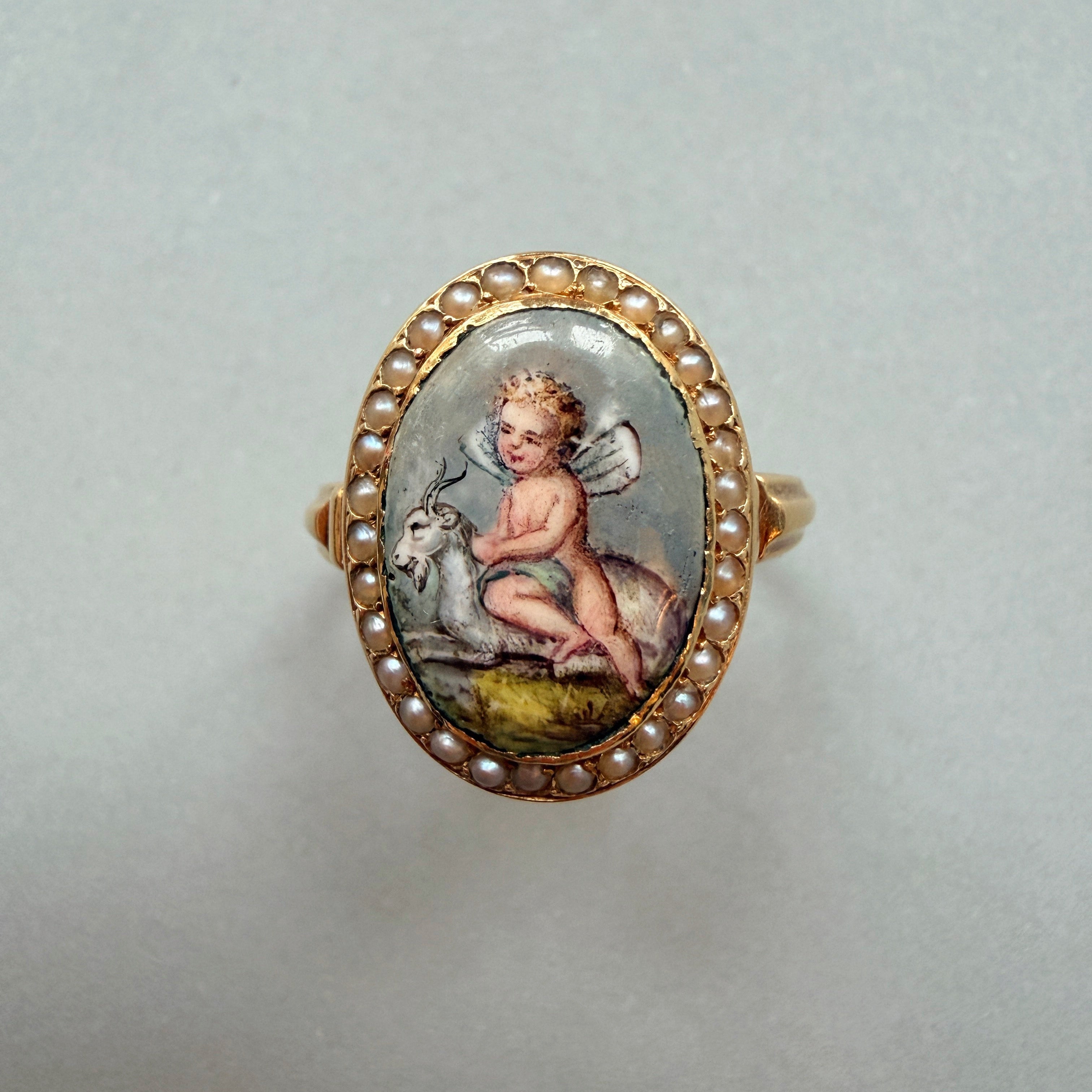 Victorian era 18K gold cherub riding a goat pearl ring