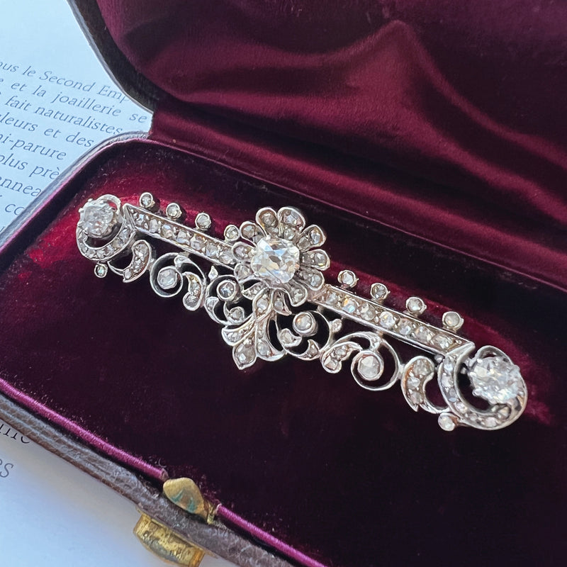 Antique boxed 18K gold diamond flower bar brooch