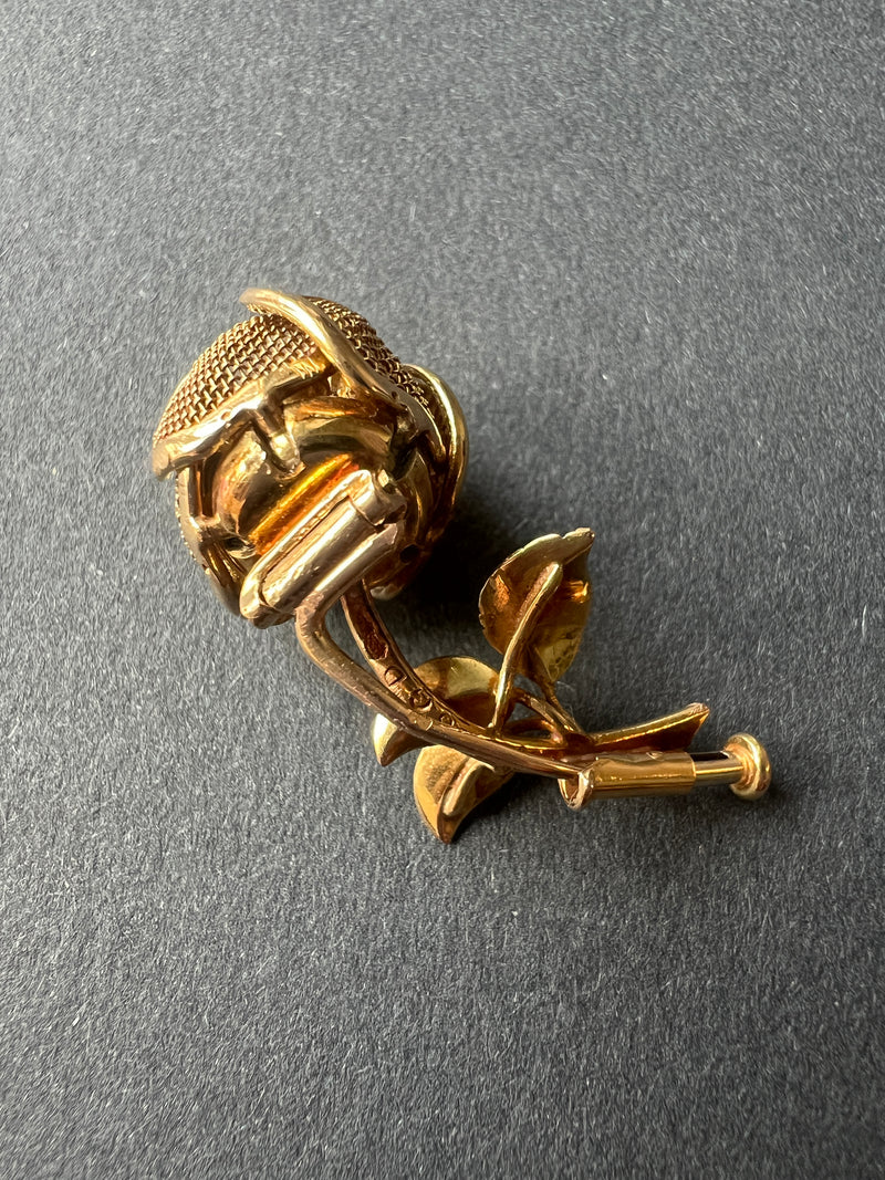 Vintage 18K gold opening rose brooch with articulated petals