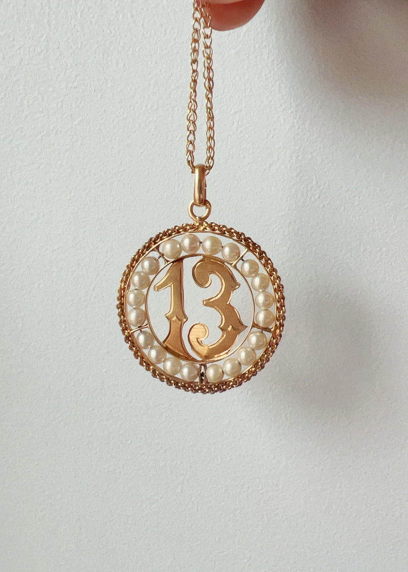 Vintage 18K gold 13 lucky charm medal pendant