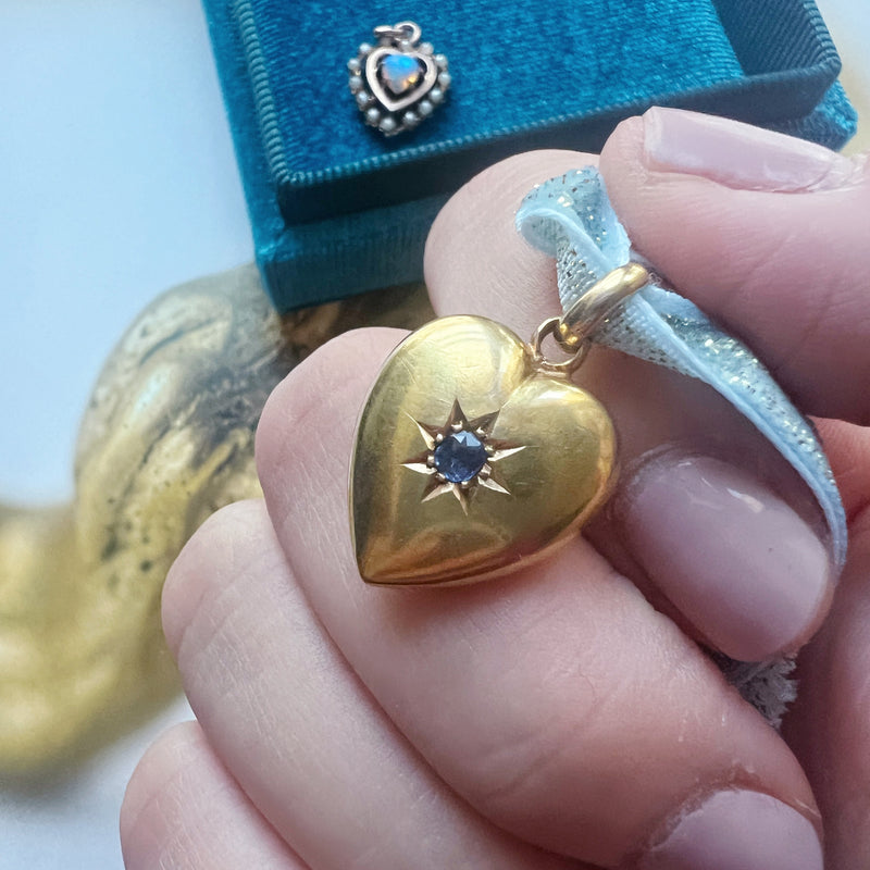 Edwardian 15K gold blue sapphire puffy heart pendant