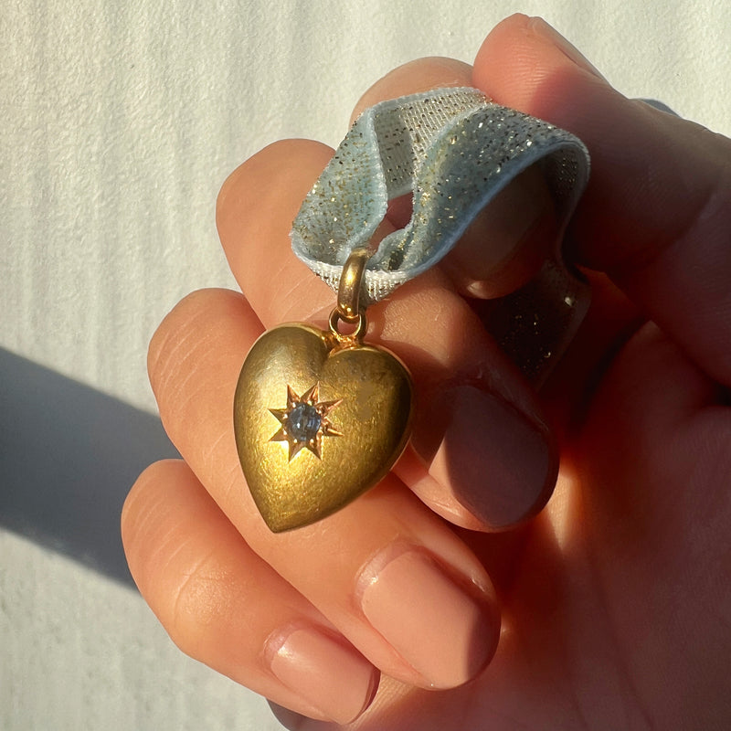 Edwardian 15K gold blue sapphire puffy heart pendant