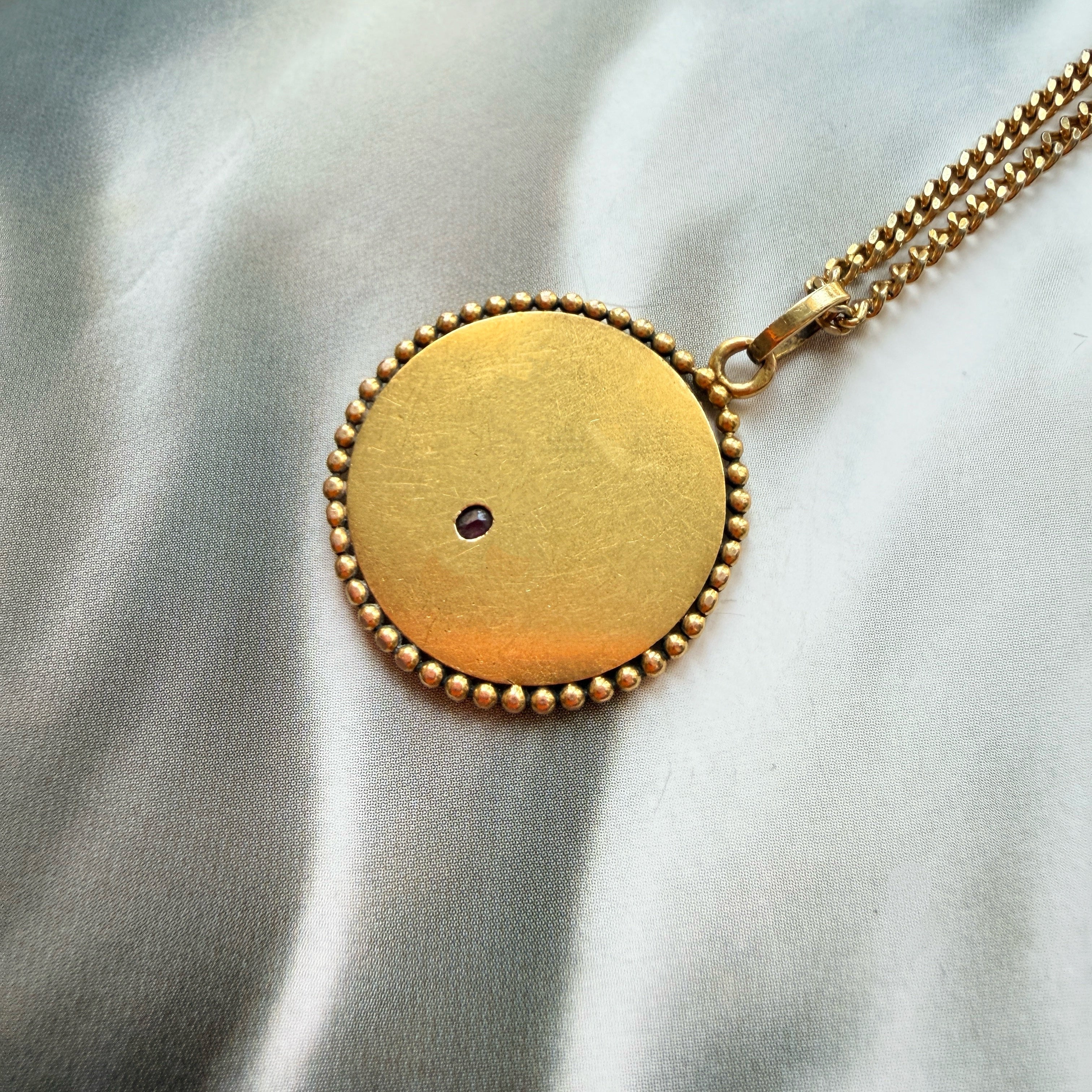 Antique 18K gold diamond ruby pendant