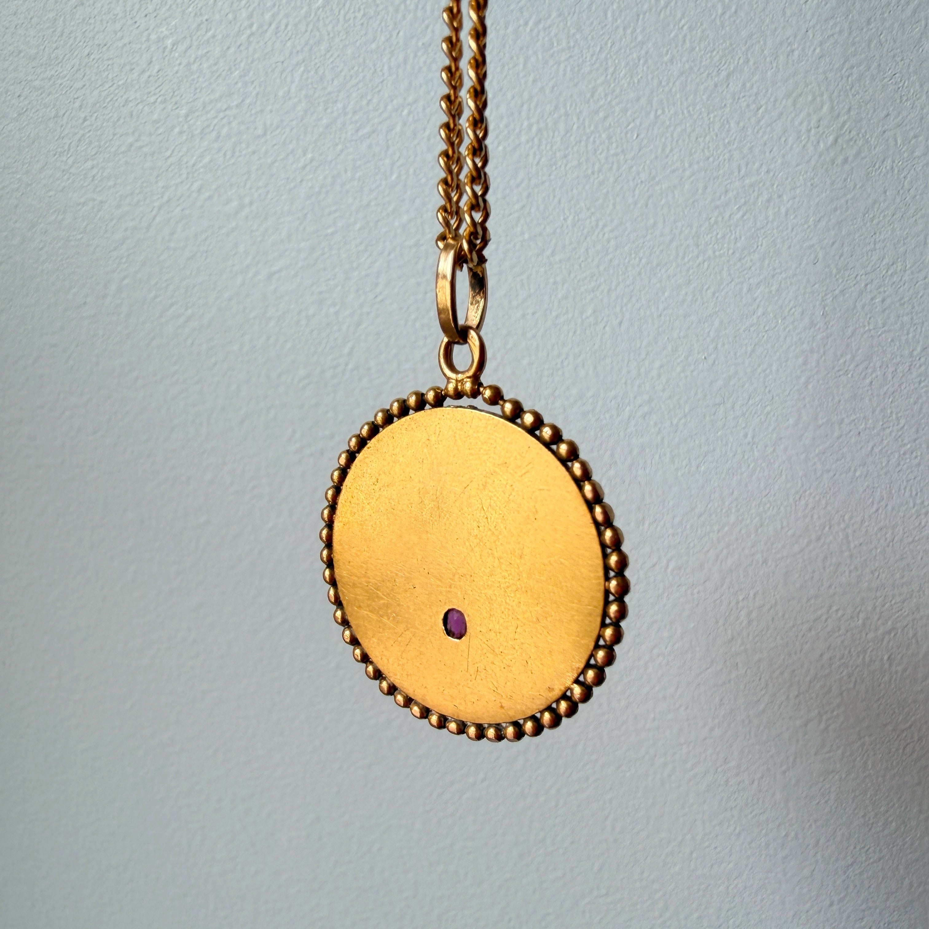 Antique 18K gold diamond ruby pendant