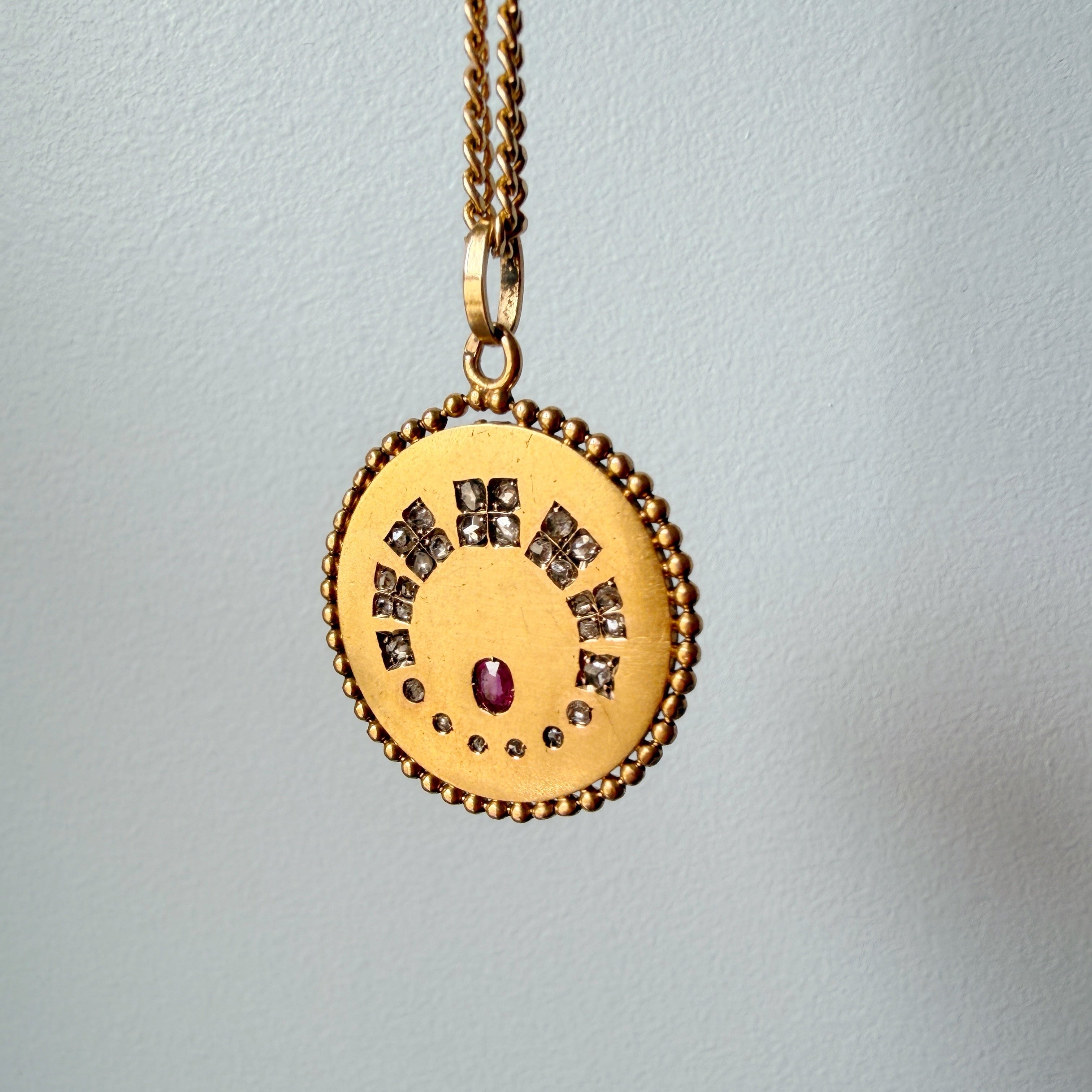 Antique 18K gold diamond ruby pendant