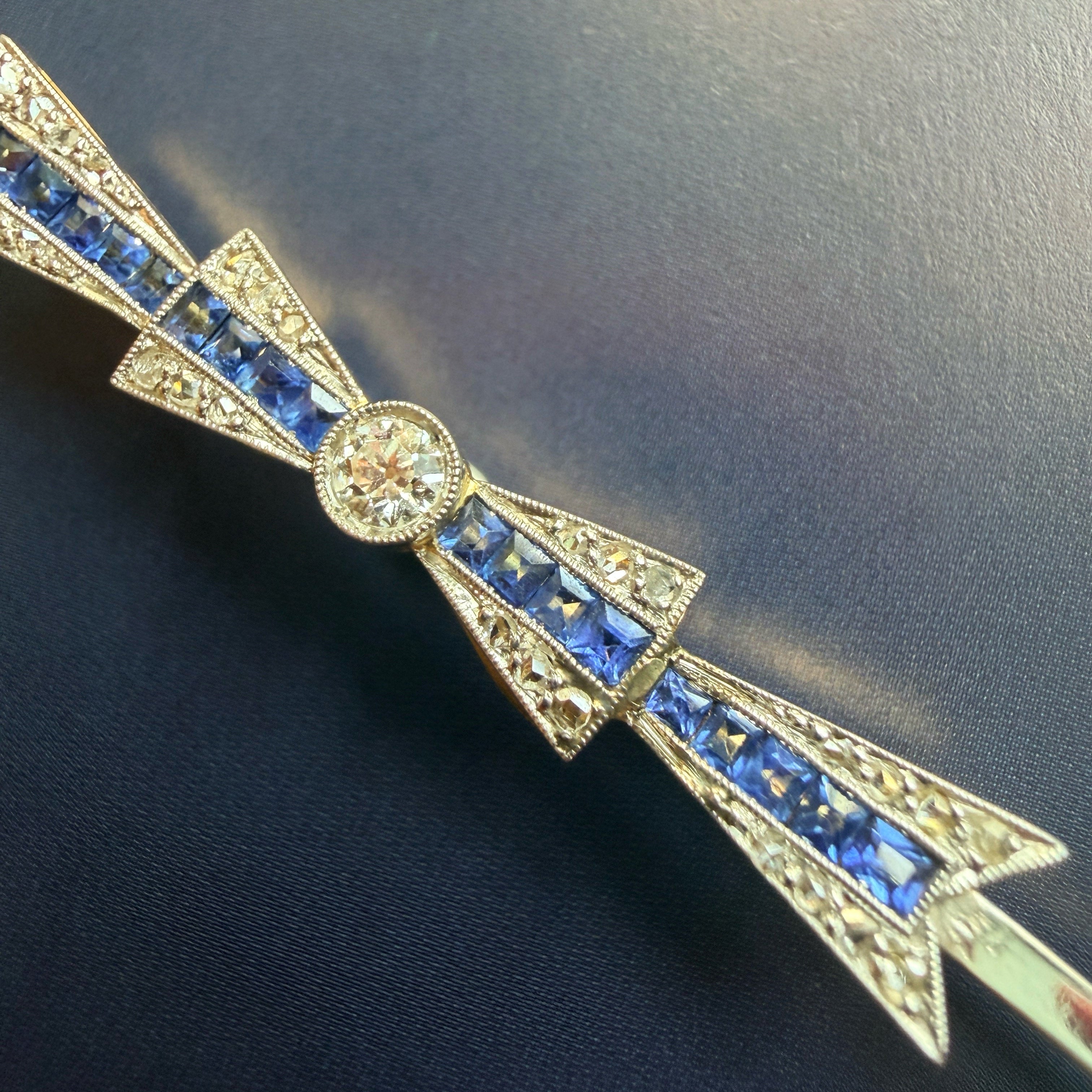 Art Deco 18K gold diamond sapphire bow brooch