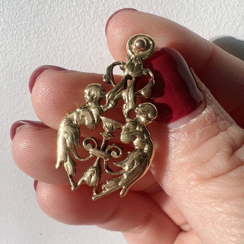 Antique 18K gold angels holding a cup earrings