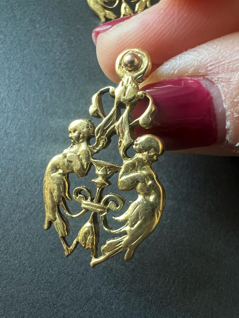 Antique 18K gold angels holding a cup earrings