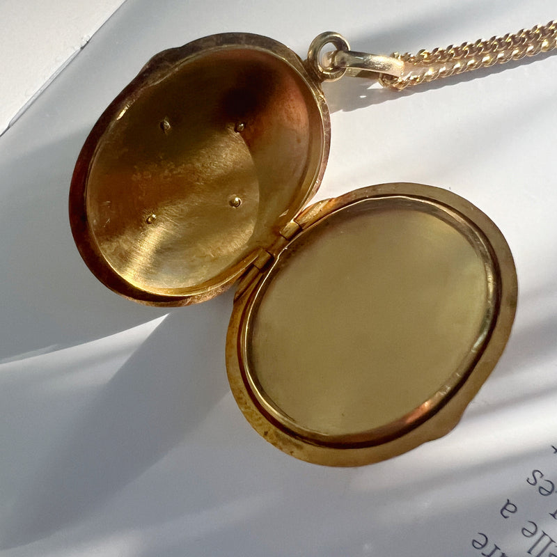 Gold locket necklace