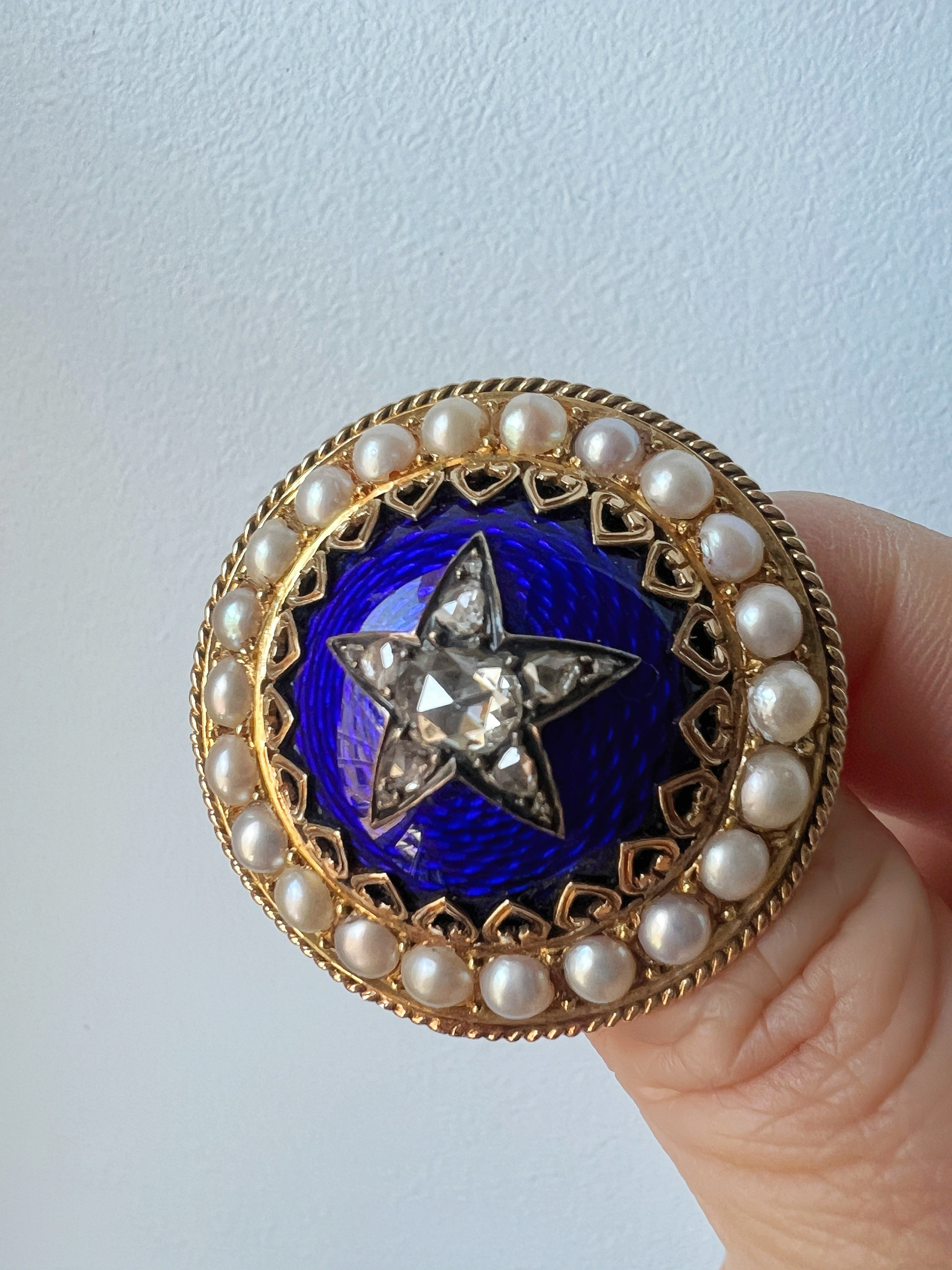 Victorian 18K gold diamond star blue enamel brooch