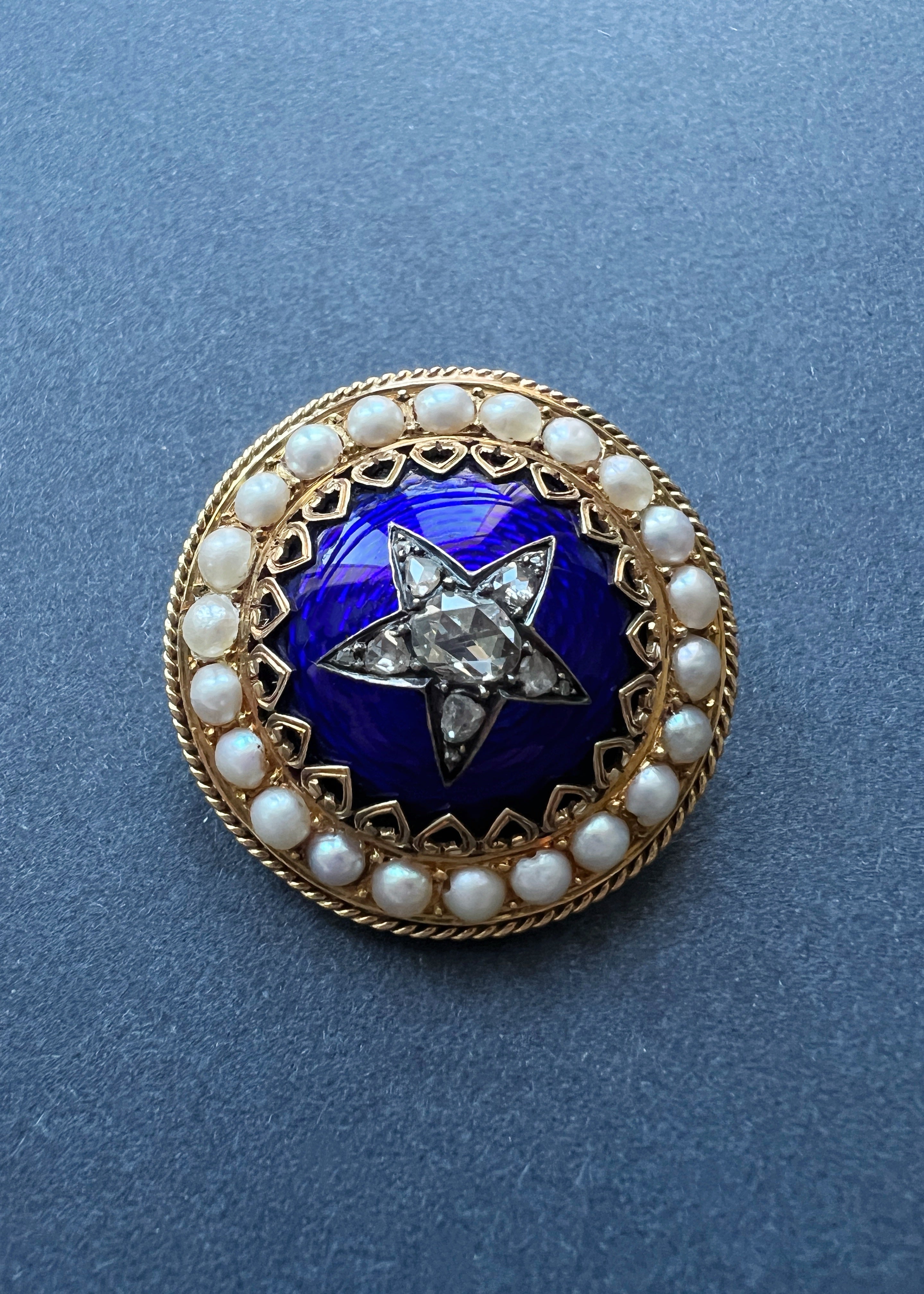 Victorian 18K gold diamond star blue enamel brooch