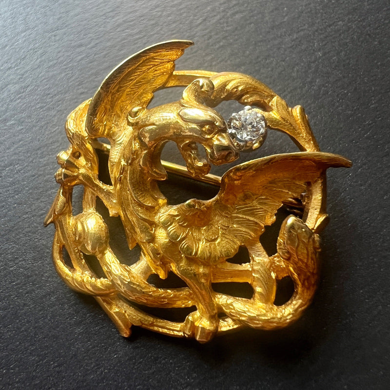 French Art Nouveau 18K gold chimera battling snake brooch