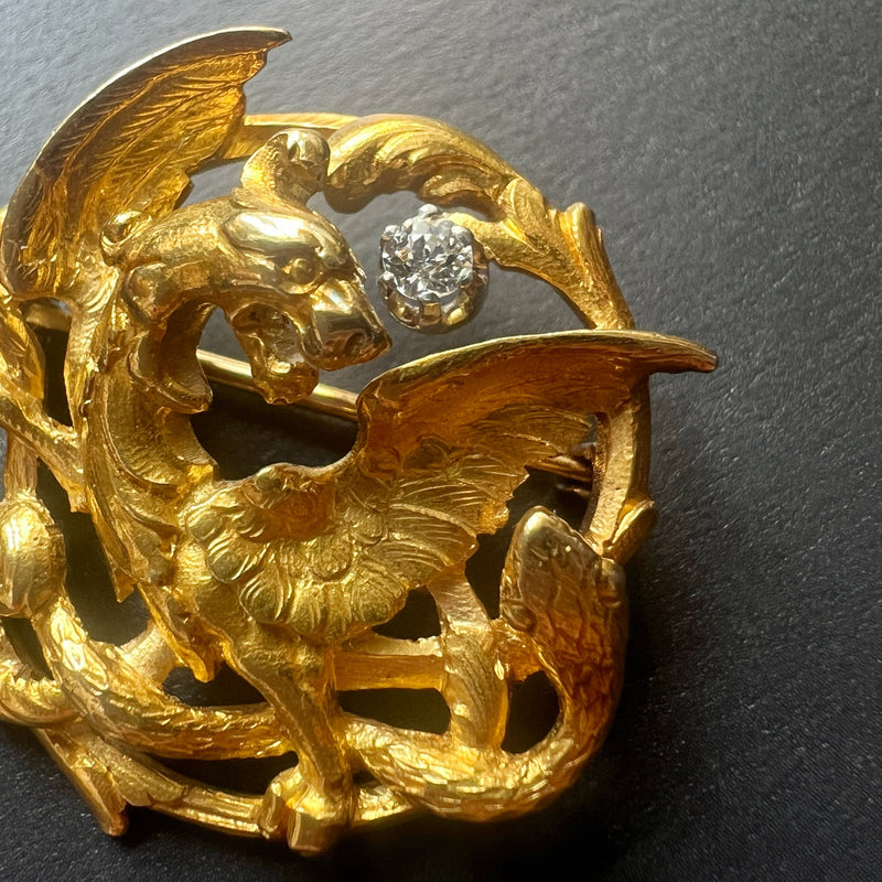 French Art Nouveau 18K gold chimera battling snake brooch