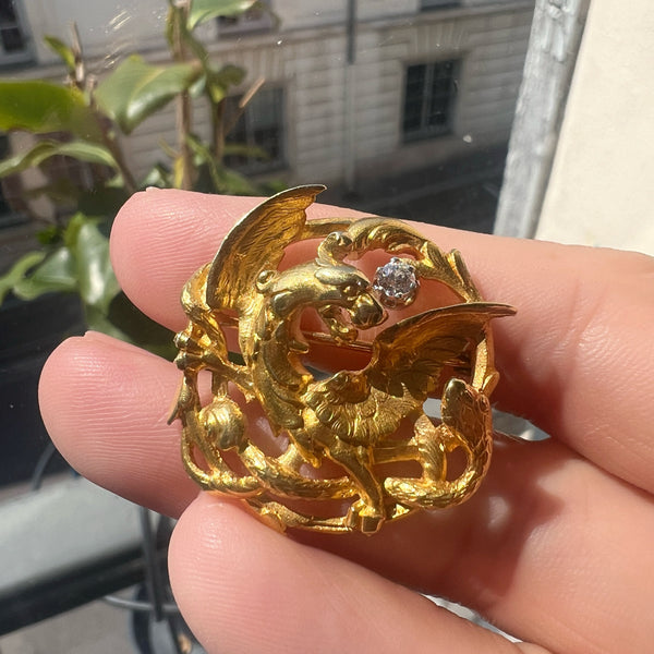 French Art Nouveau 18K gold chimera battling snake brooch