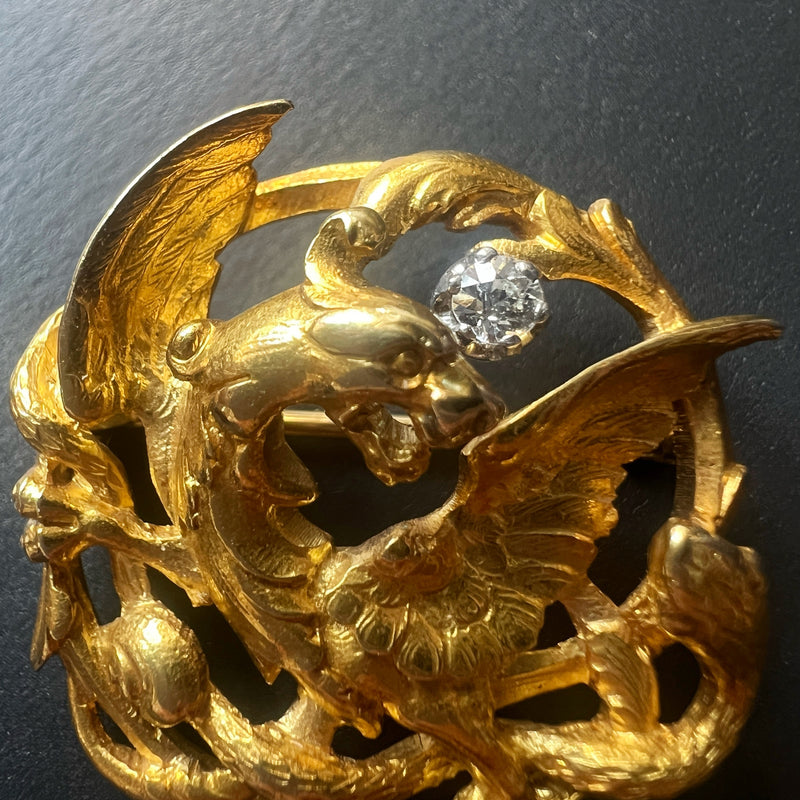 French Art Nouveau 18K gold chimera battling snake brooch