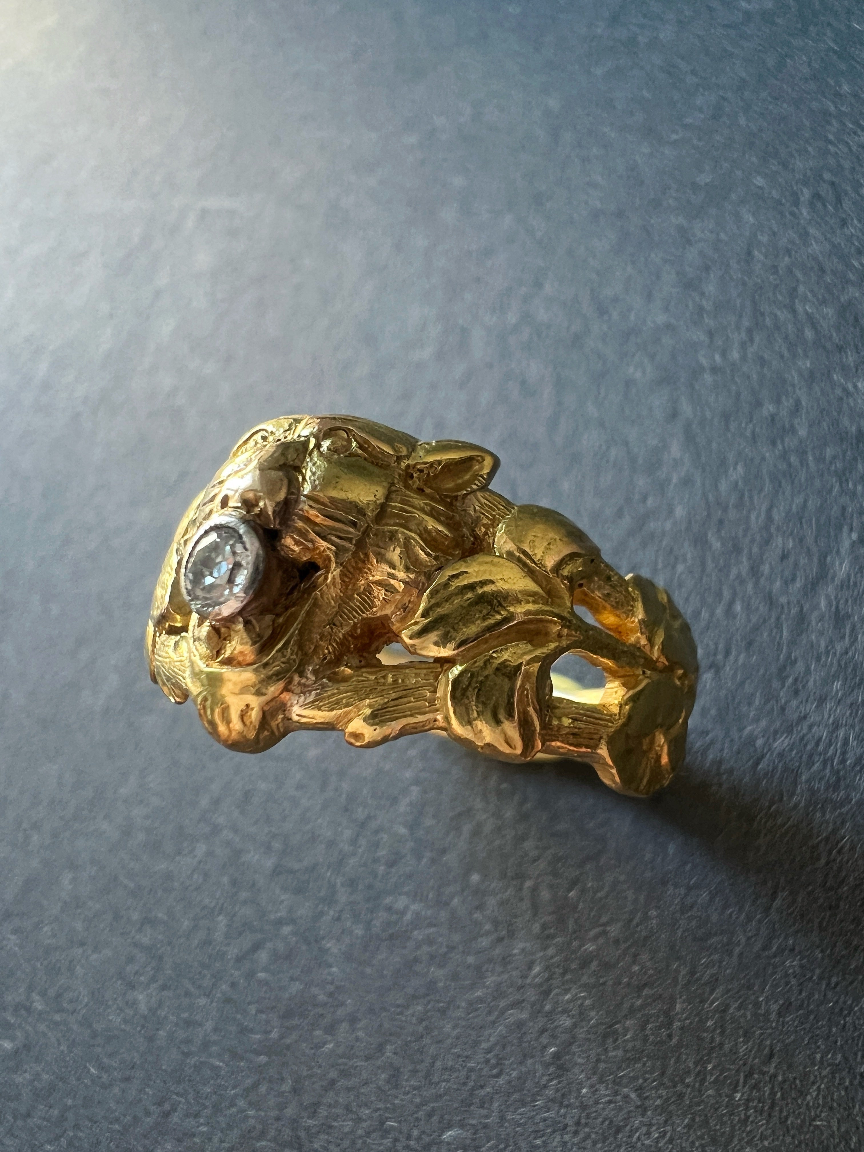 French Art Nouveau 18K gold lion ring with diamond