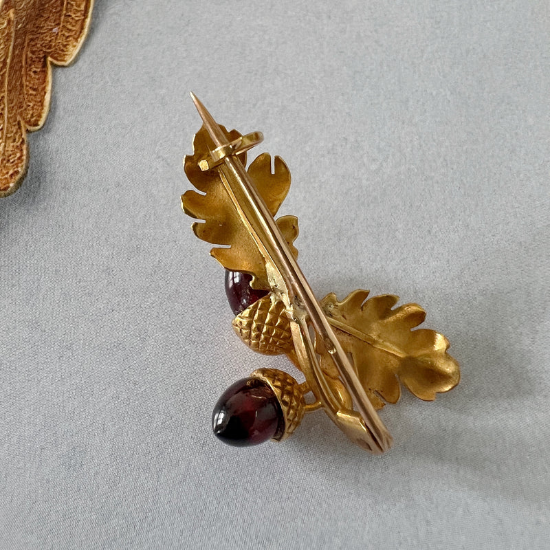 Victorian era 18K gold garnet acorn brooch