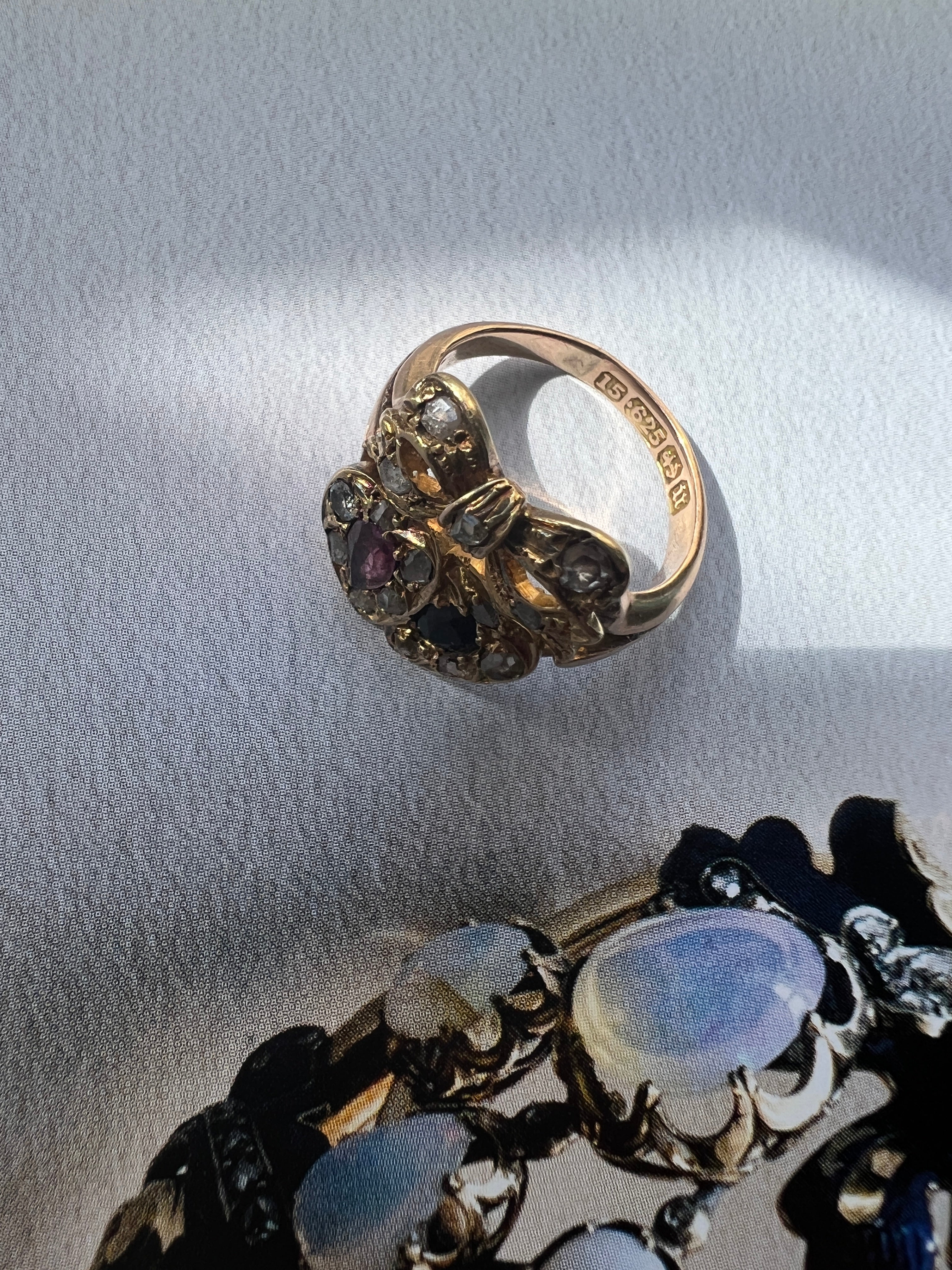 Antique ruby sapphire diamond double heart bow ring