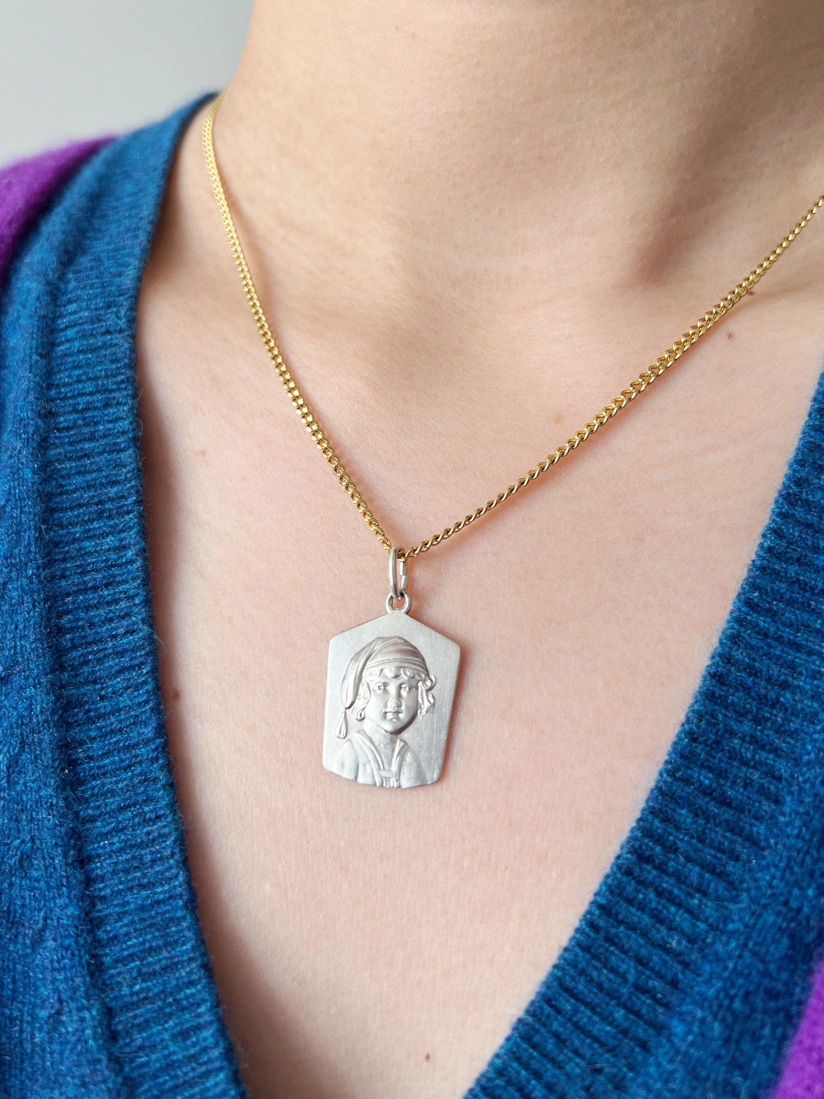 Antique silver young child portrait pendant - Curiously timeless