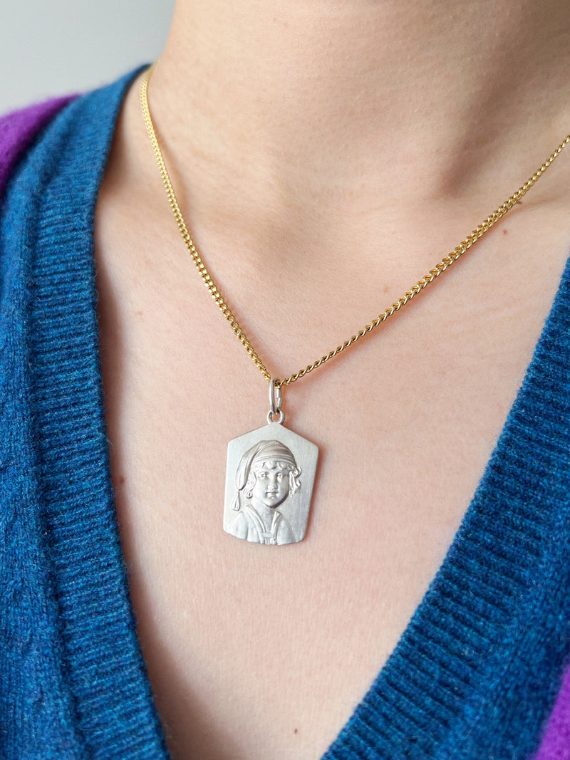 Antique silver young child portrait pendant