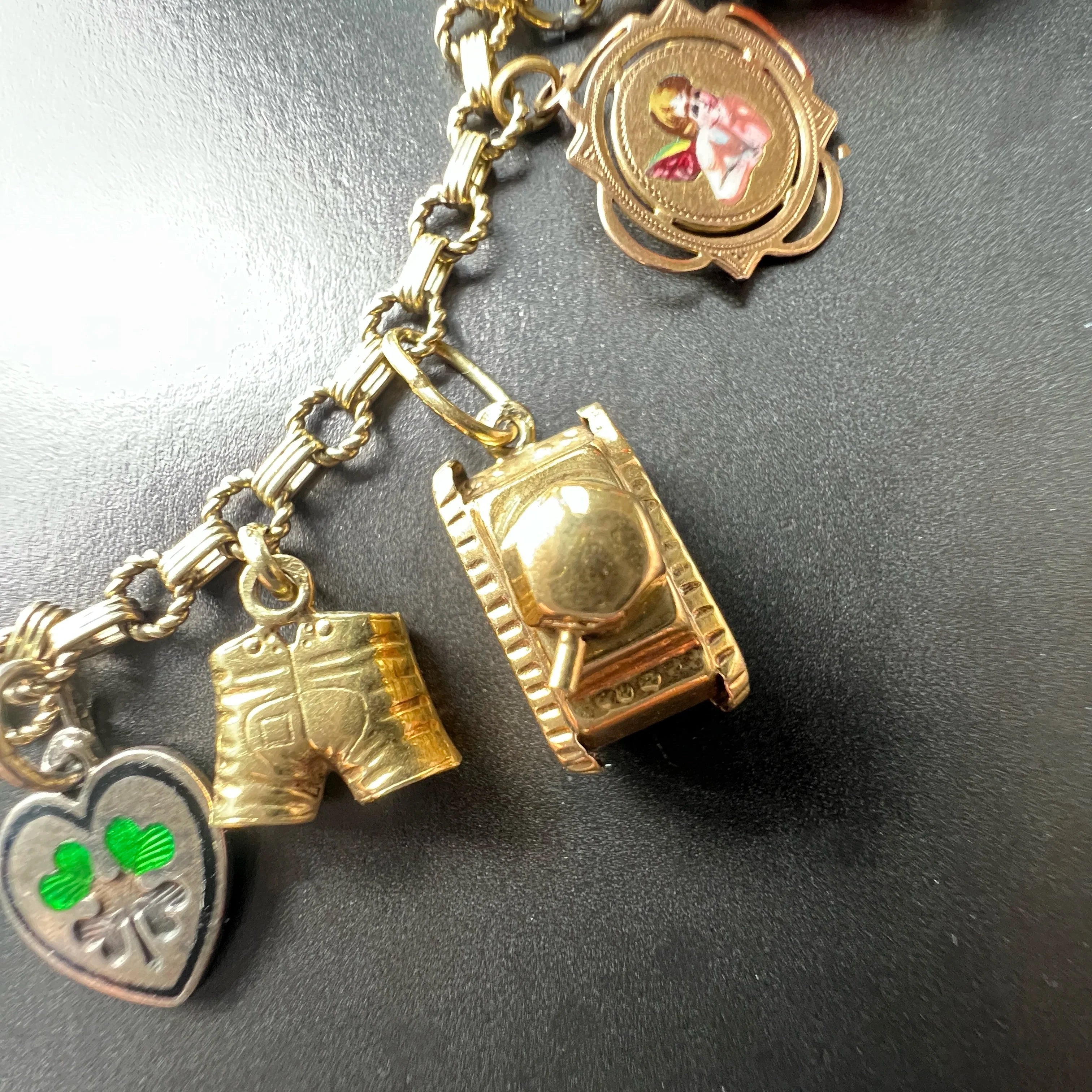 14K yellow Gold charm bracelet
