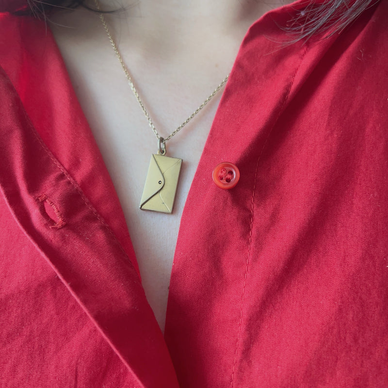 Antique silver envelope with a letter charm pendant