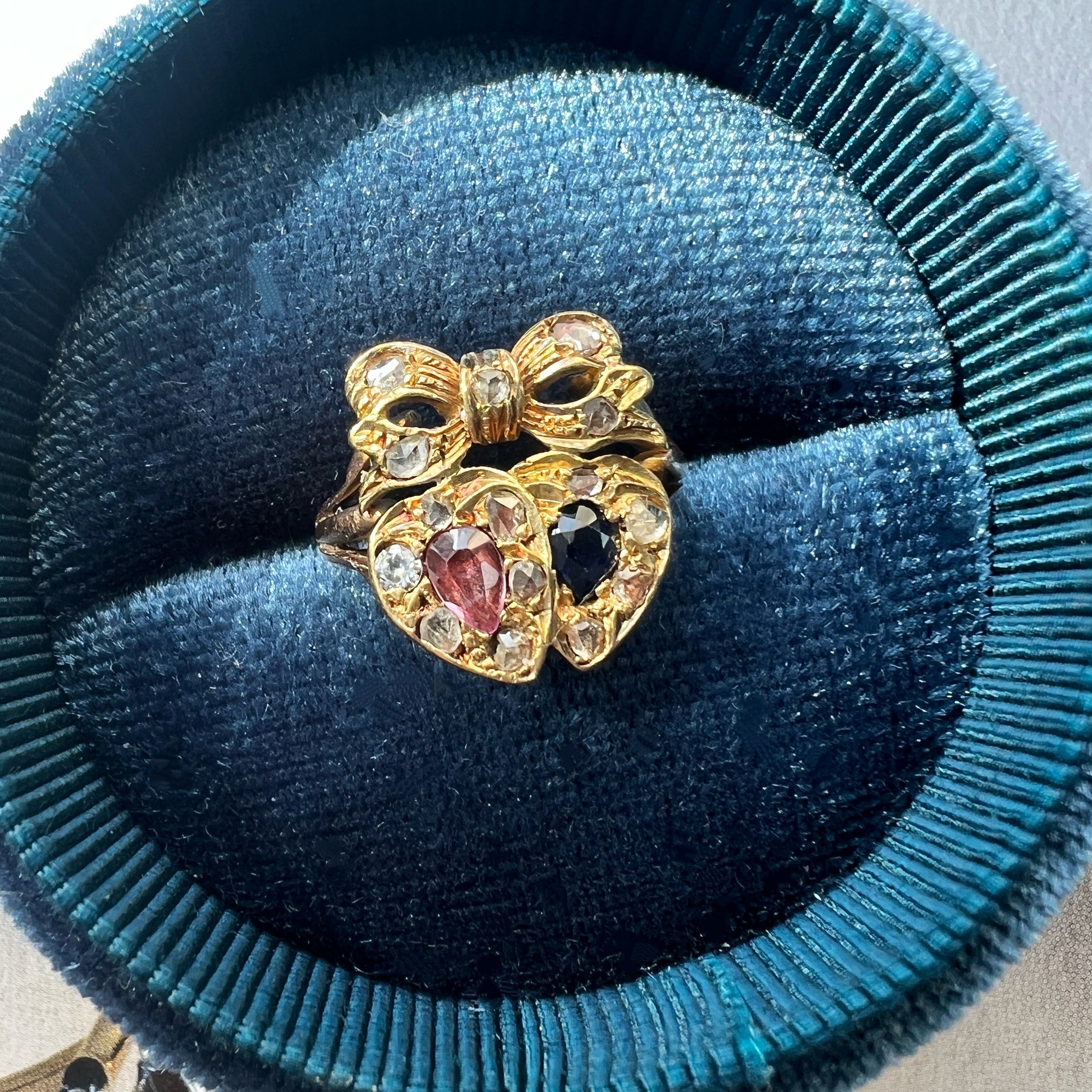 Antique ruby sapphire diamond double heart bow ring