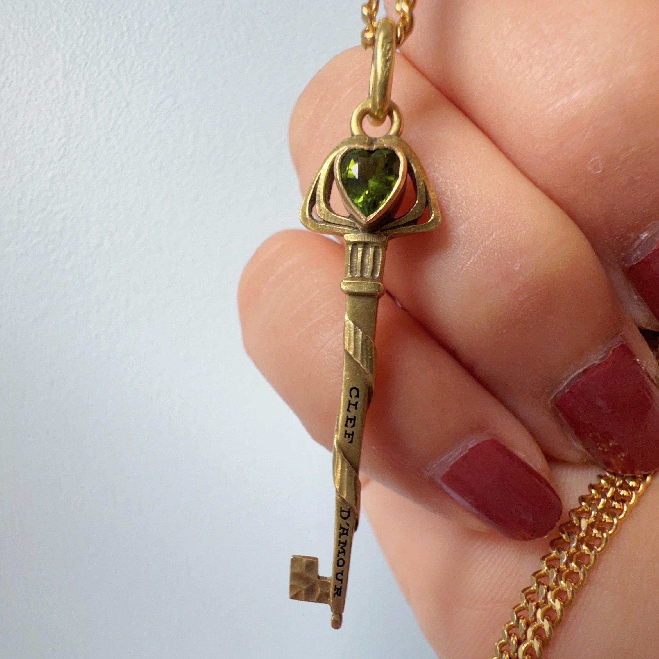 Reserved for F - Antique 18K gold peridot key of love pendant